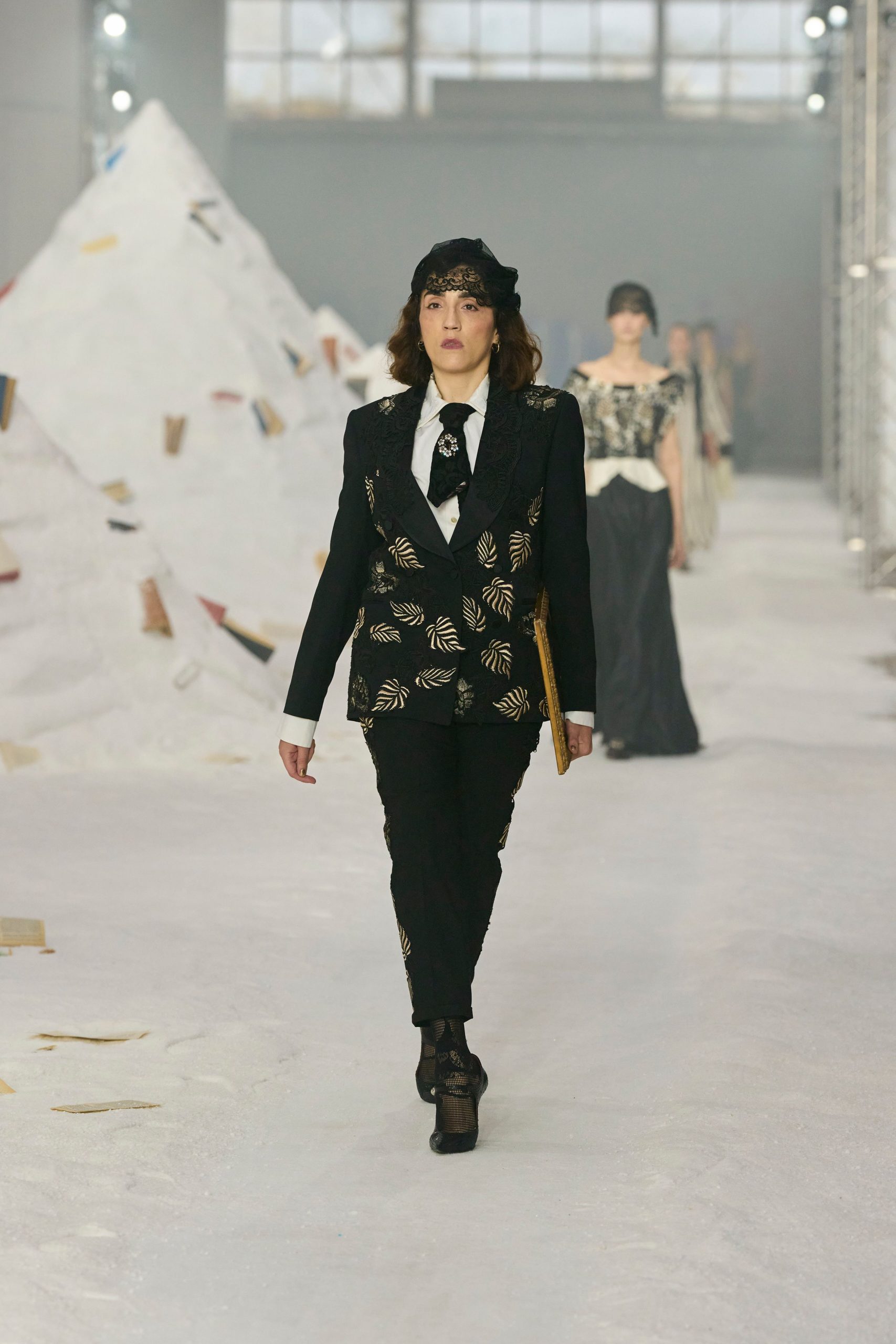 black and gold tailored suit