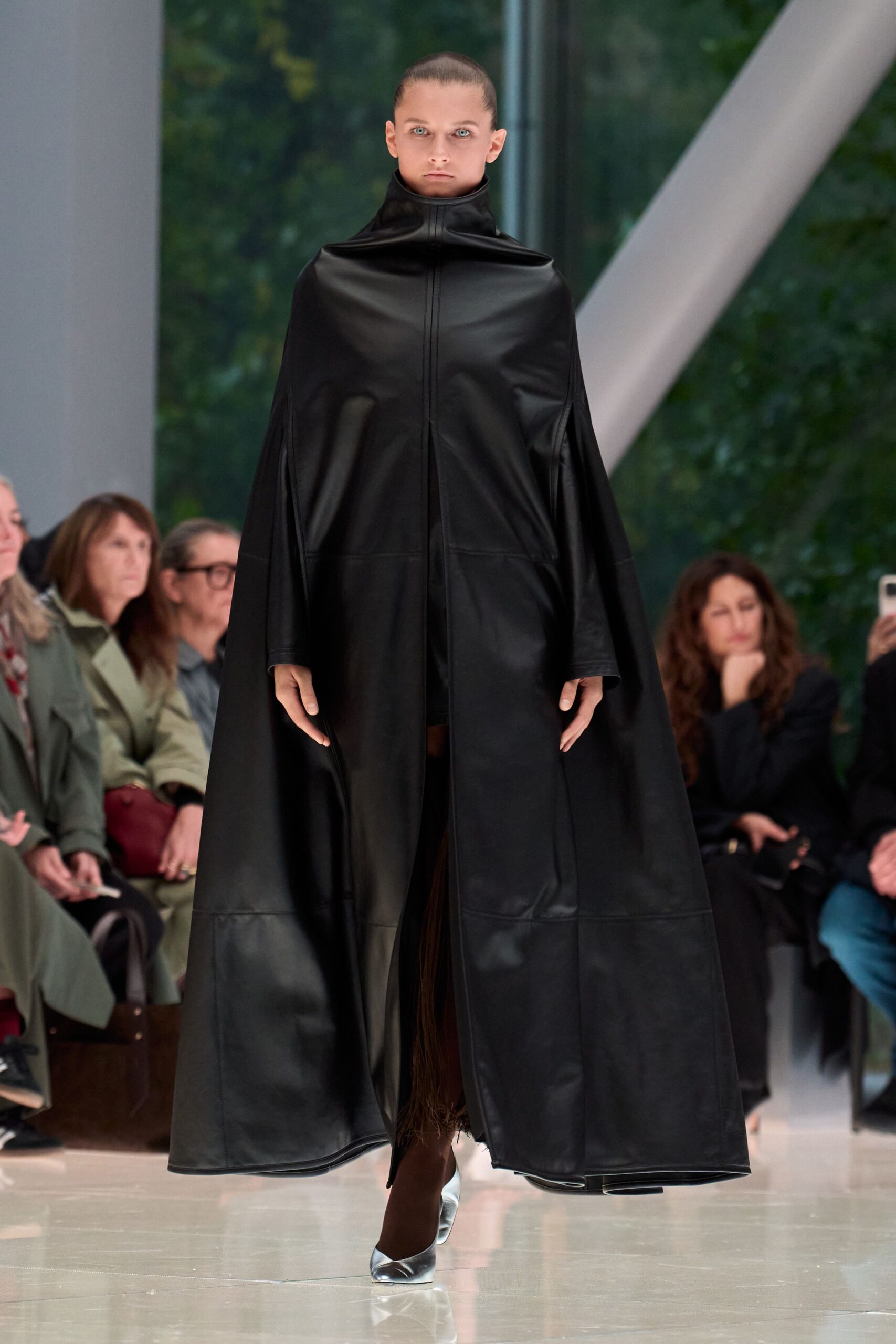 black leather cape with silver shoes