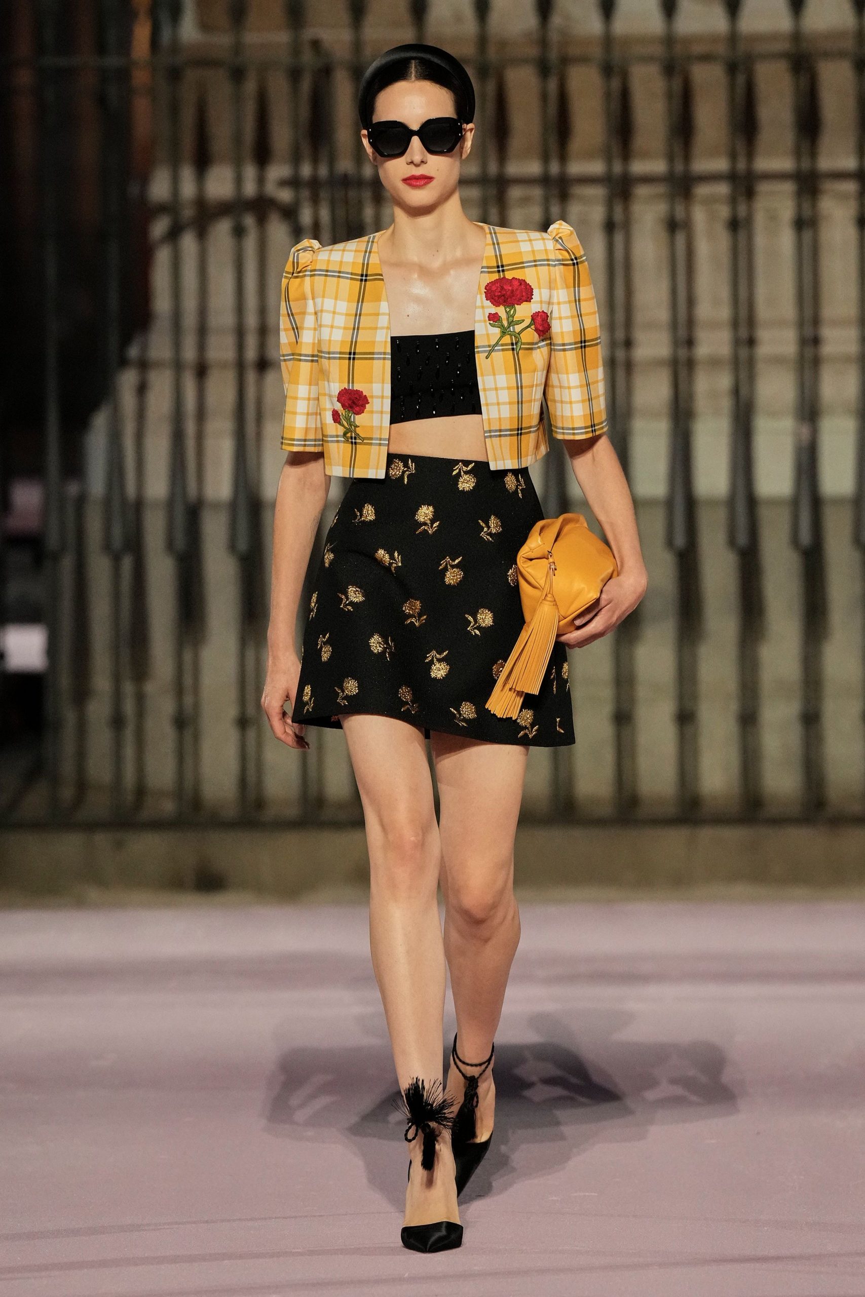 yellow checked blazer with black skirt