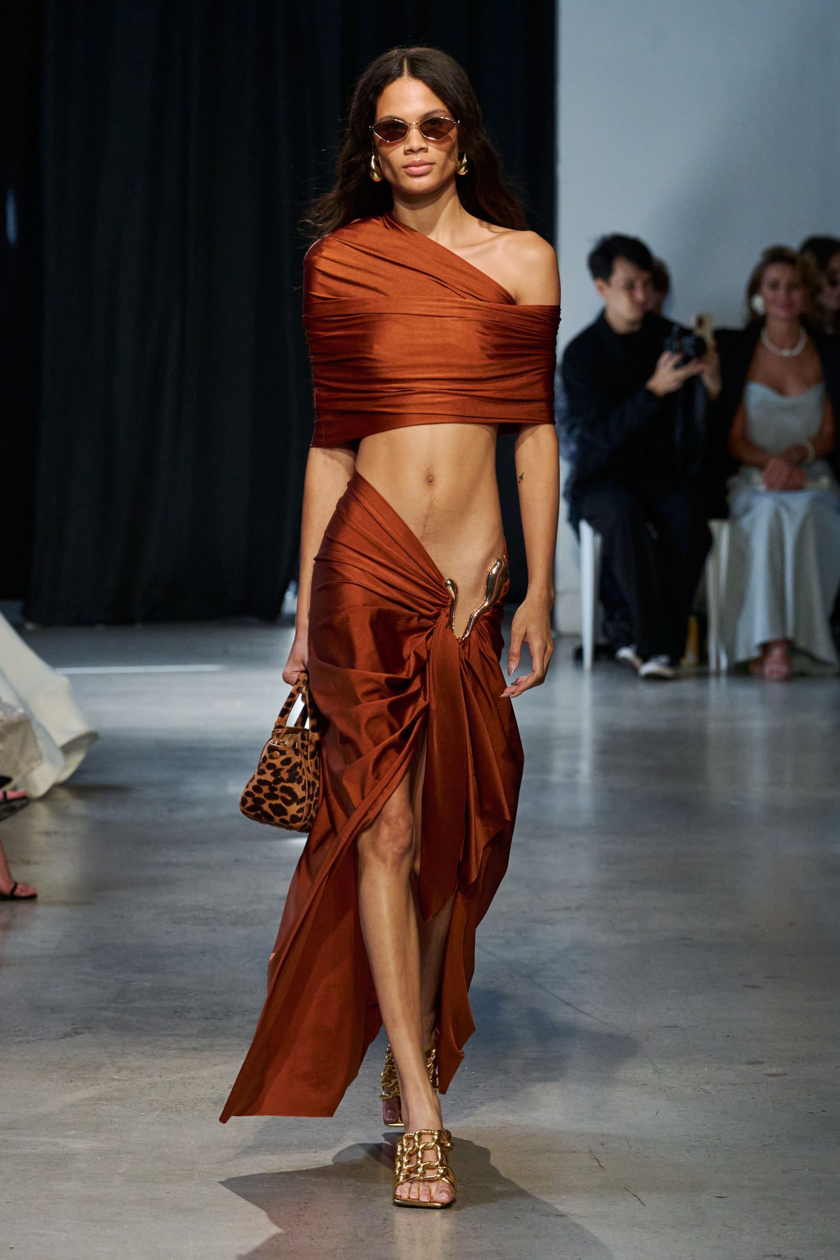brown silk sleeveless off-shoulder fitted ruched flowing dress