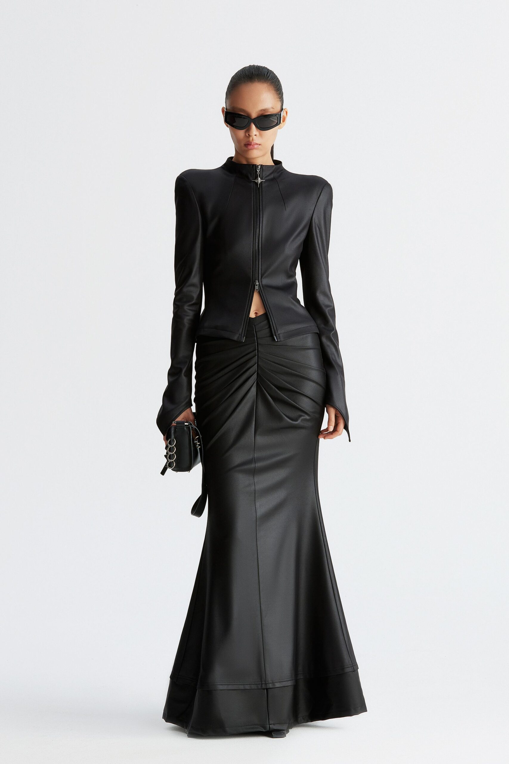 black leather long-sleeve v-neck fitted ruched flared gown