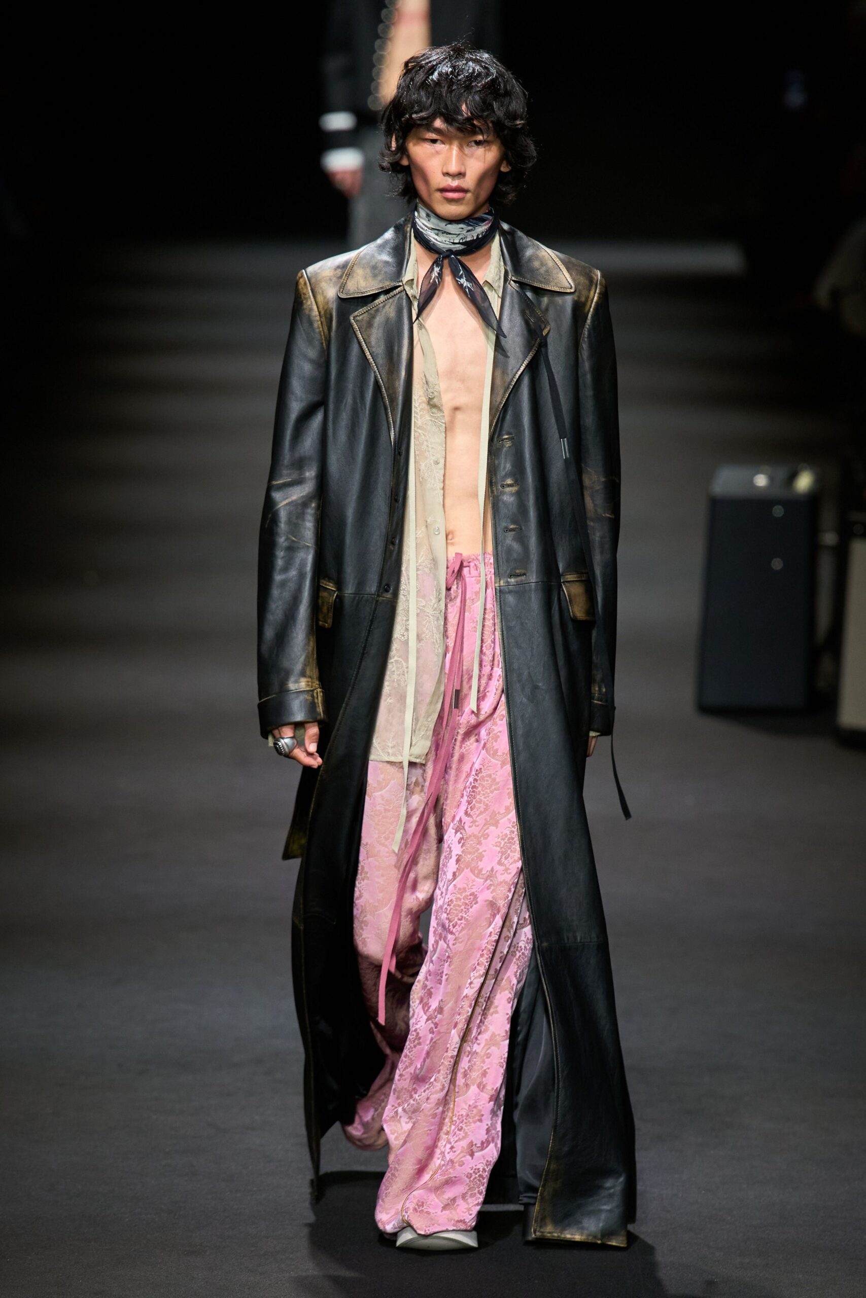 black leather coat with pink lace pants