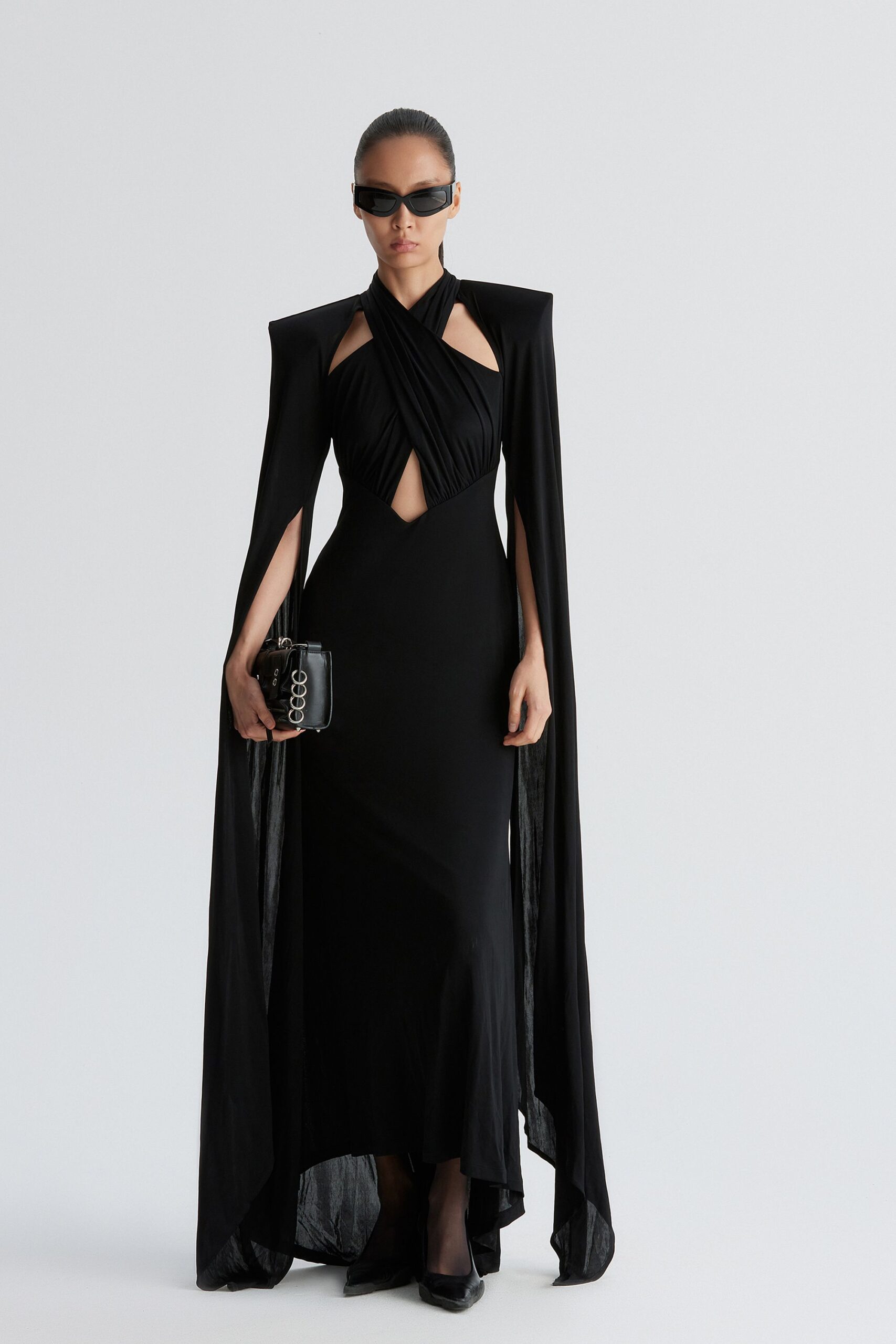 black fitted gown with cape