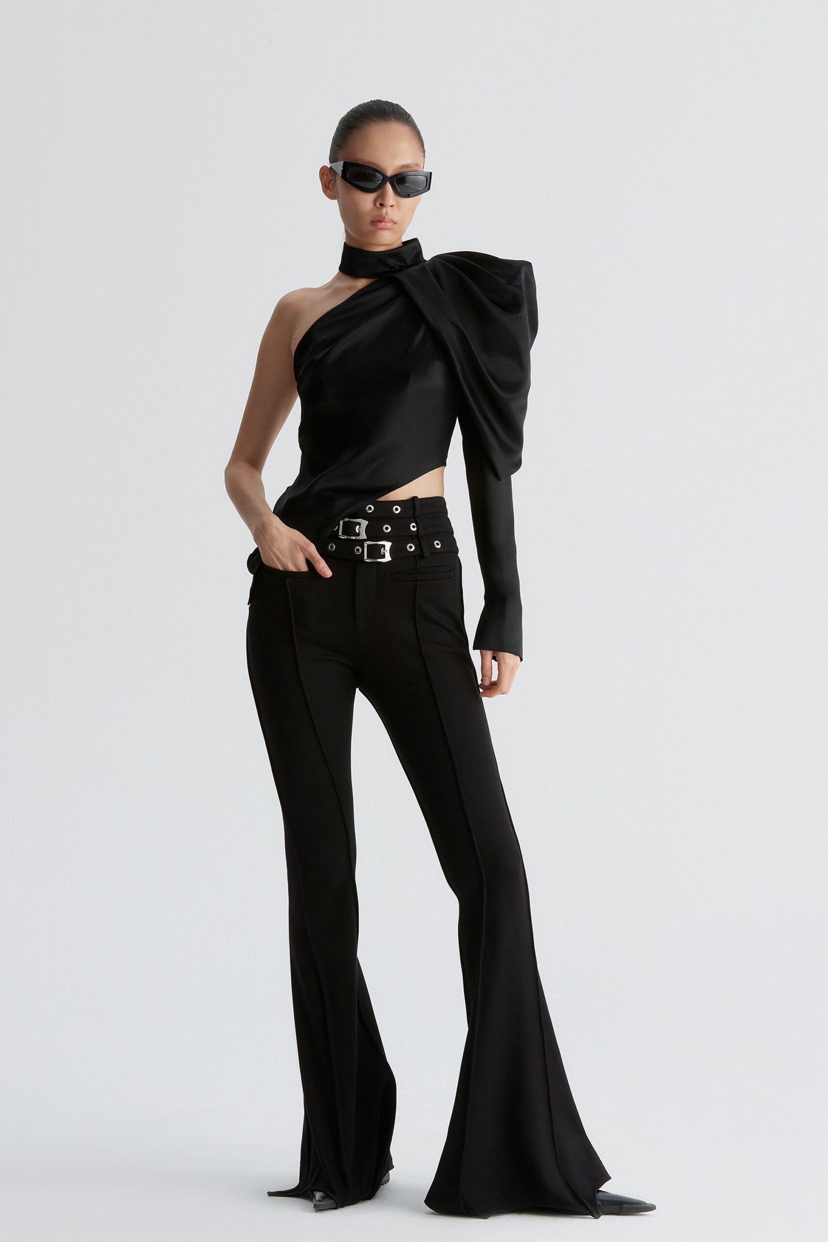 black fitted top and flared pants