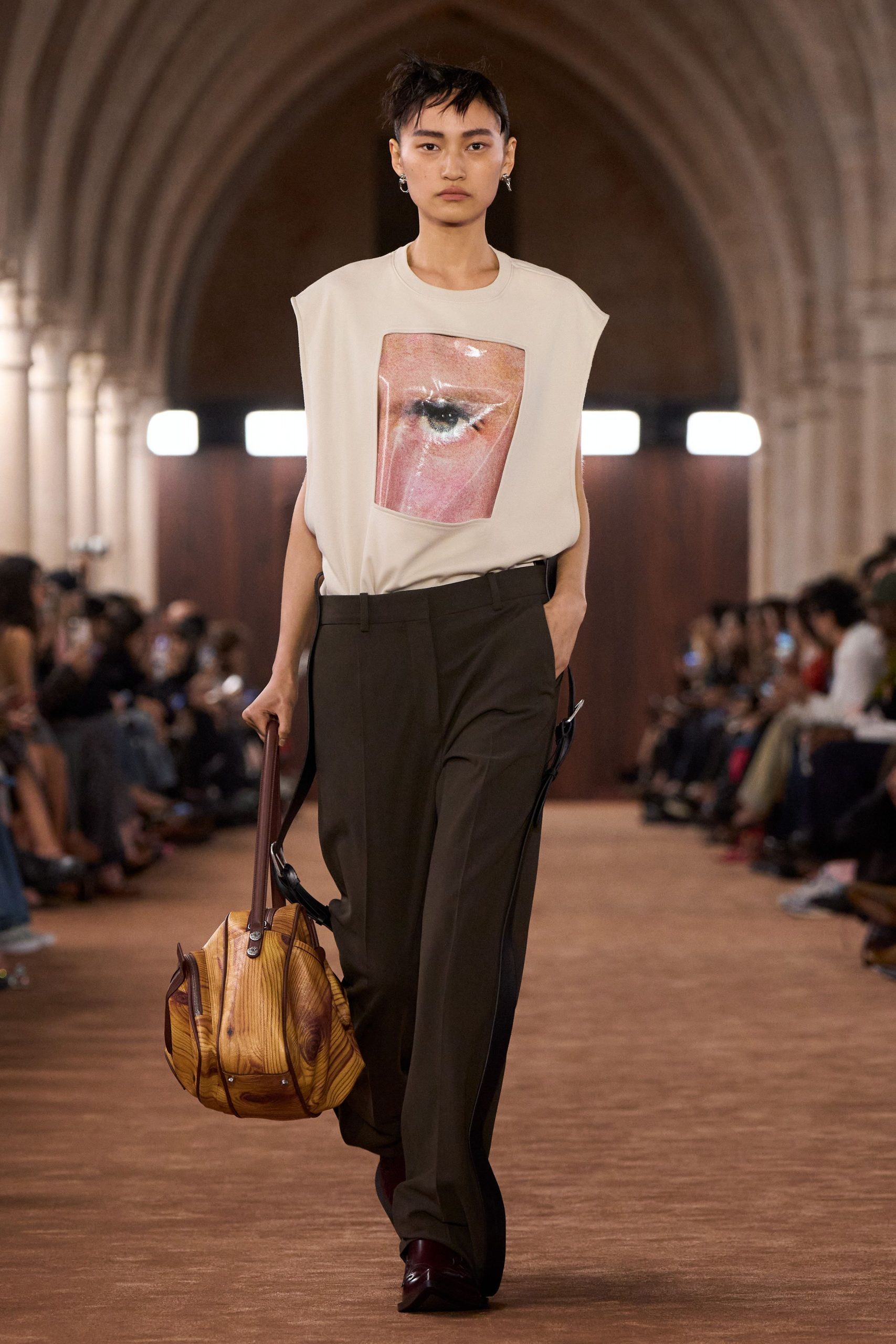 white printed t-shirt with brown pants