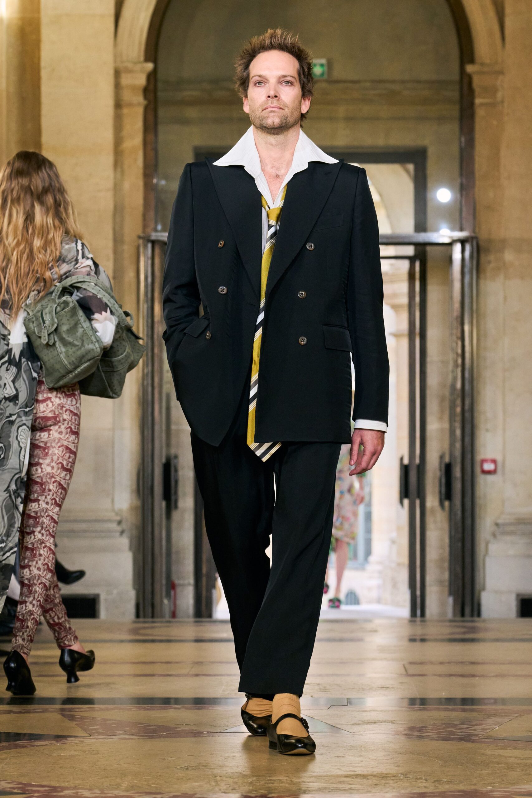 black tailored suit with striped shirt