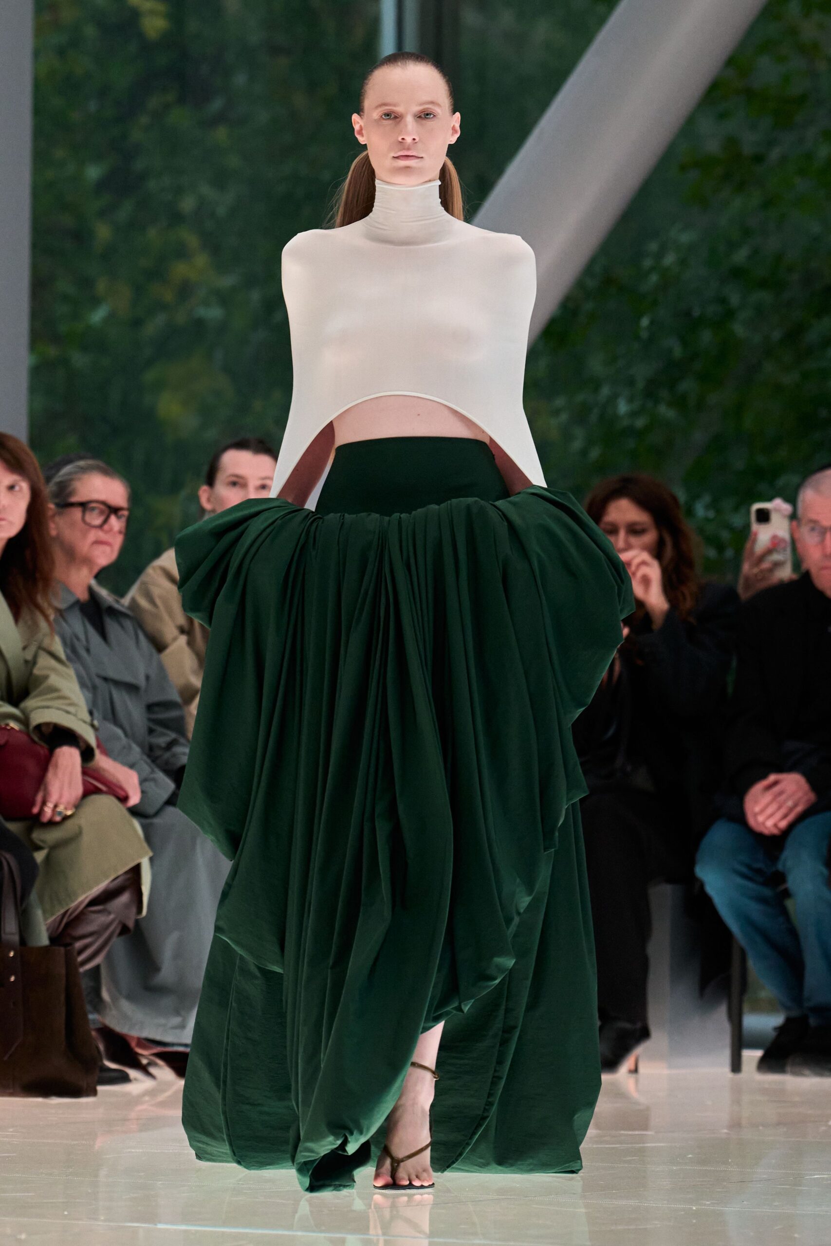 white fitted top green layered skirt