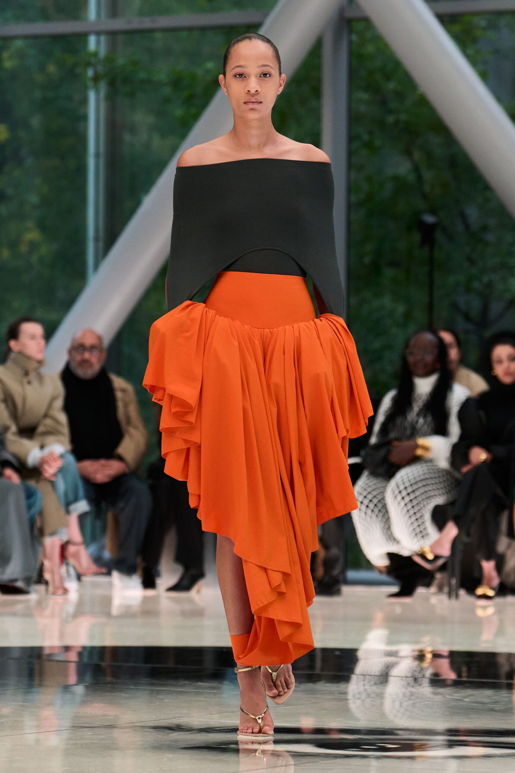 off-shoulder orange dress with black top