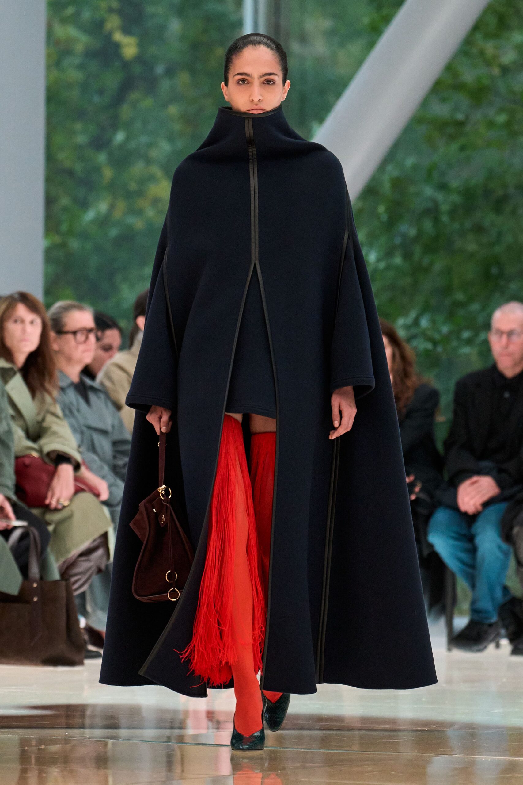navy wool cape with red pants