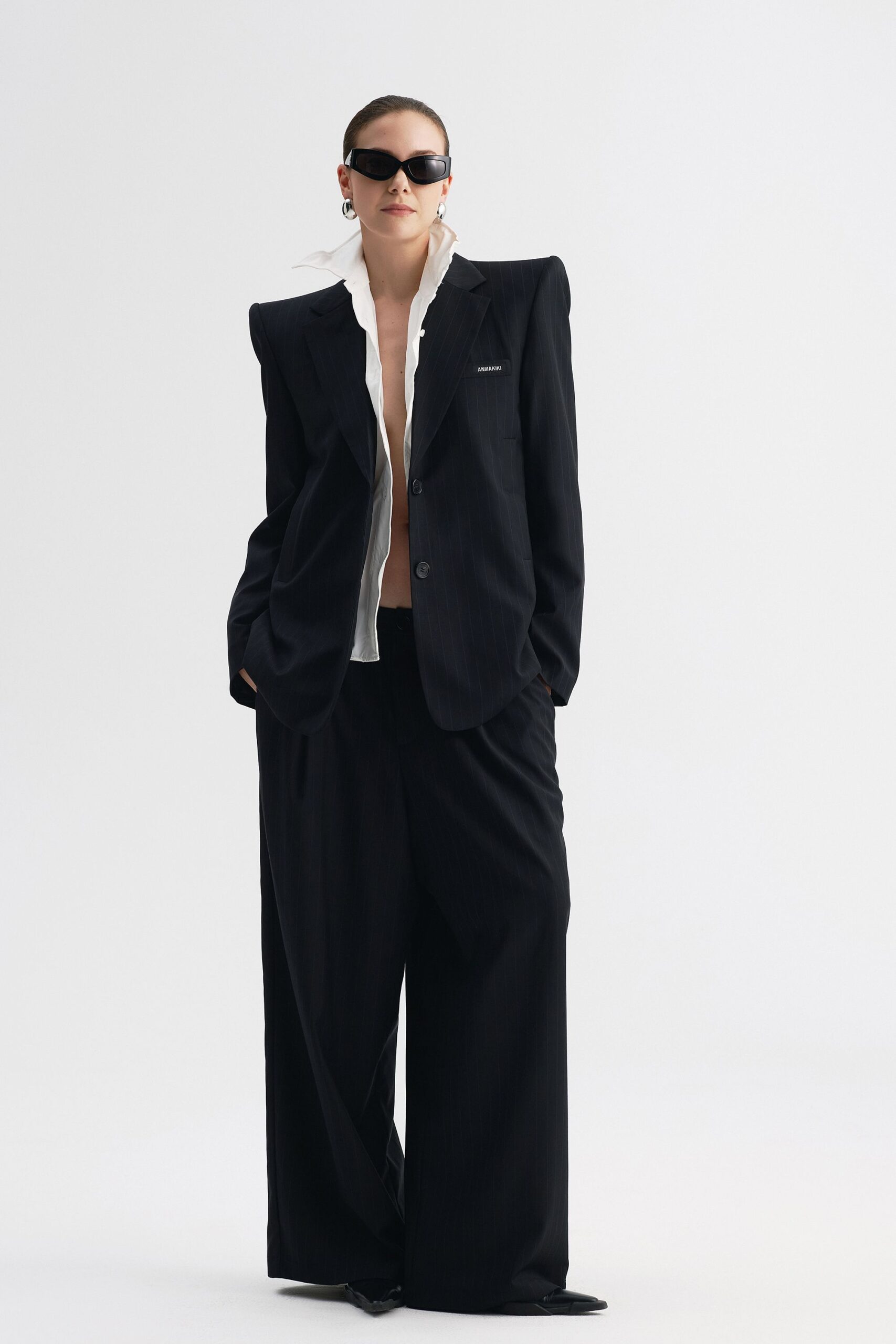 black tailored blazer with wide-leg pants