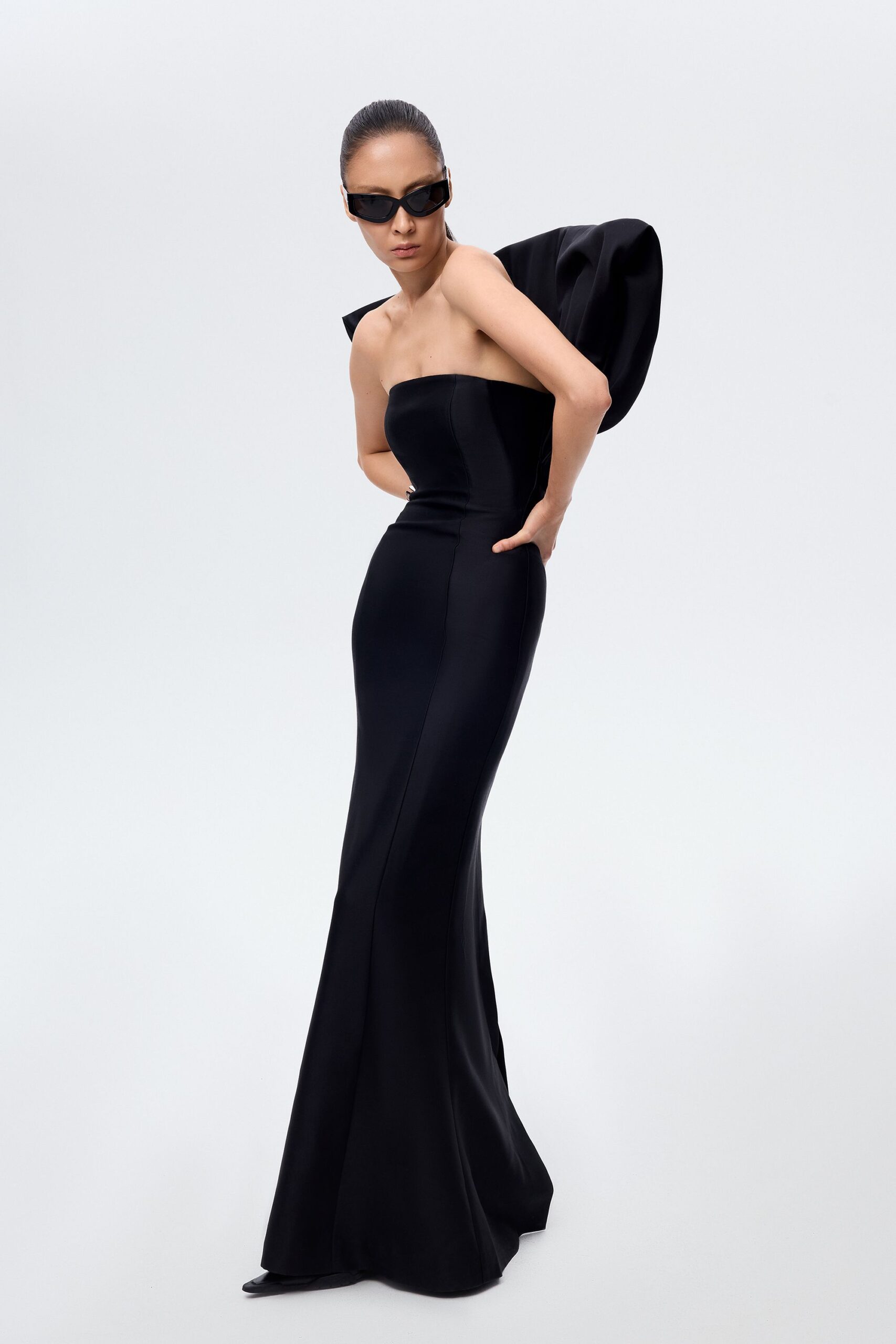 black satin strapless long-sleeve fitted draped maxi gown