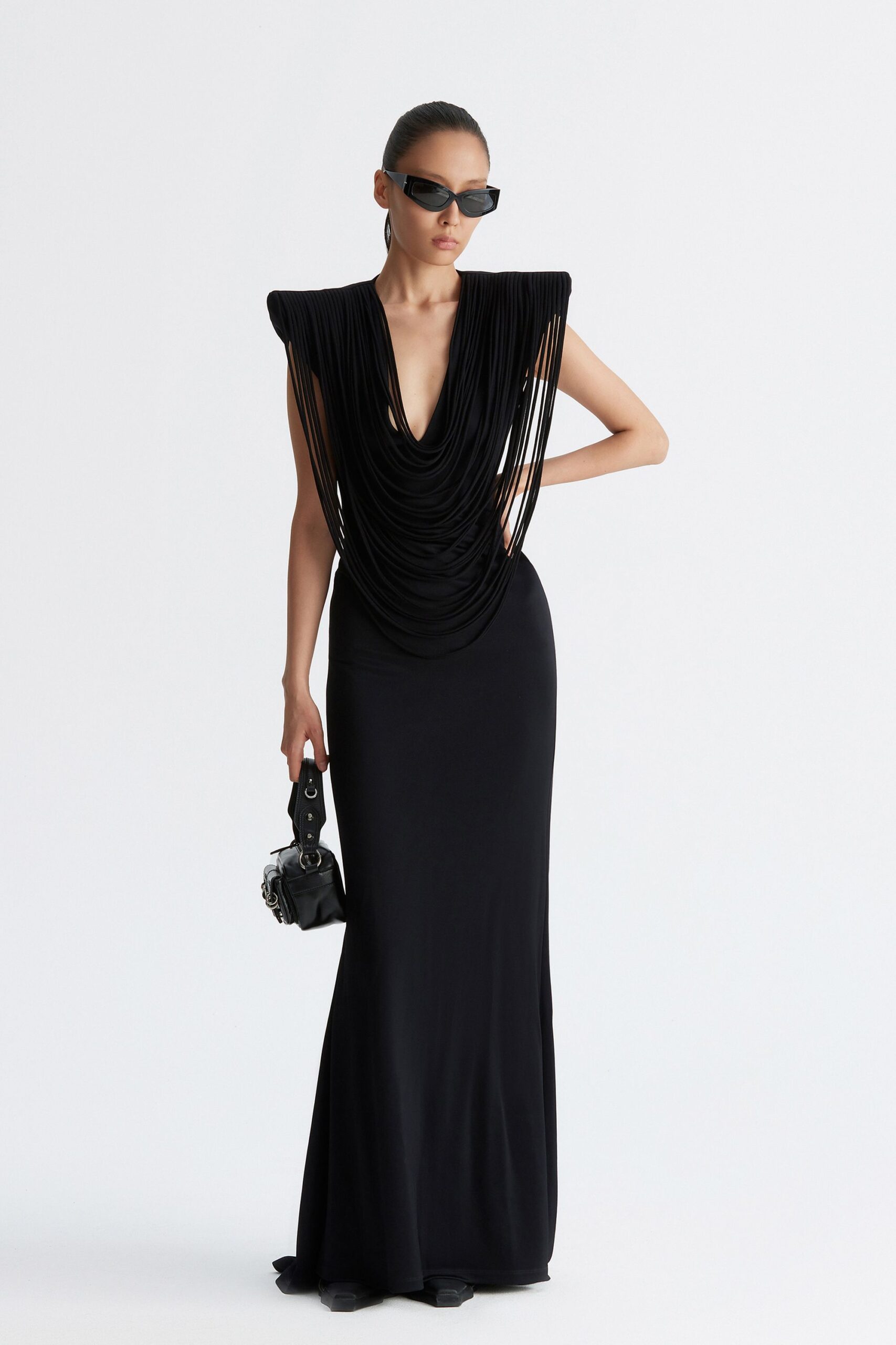 black draped gown with accessories