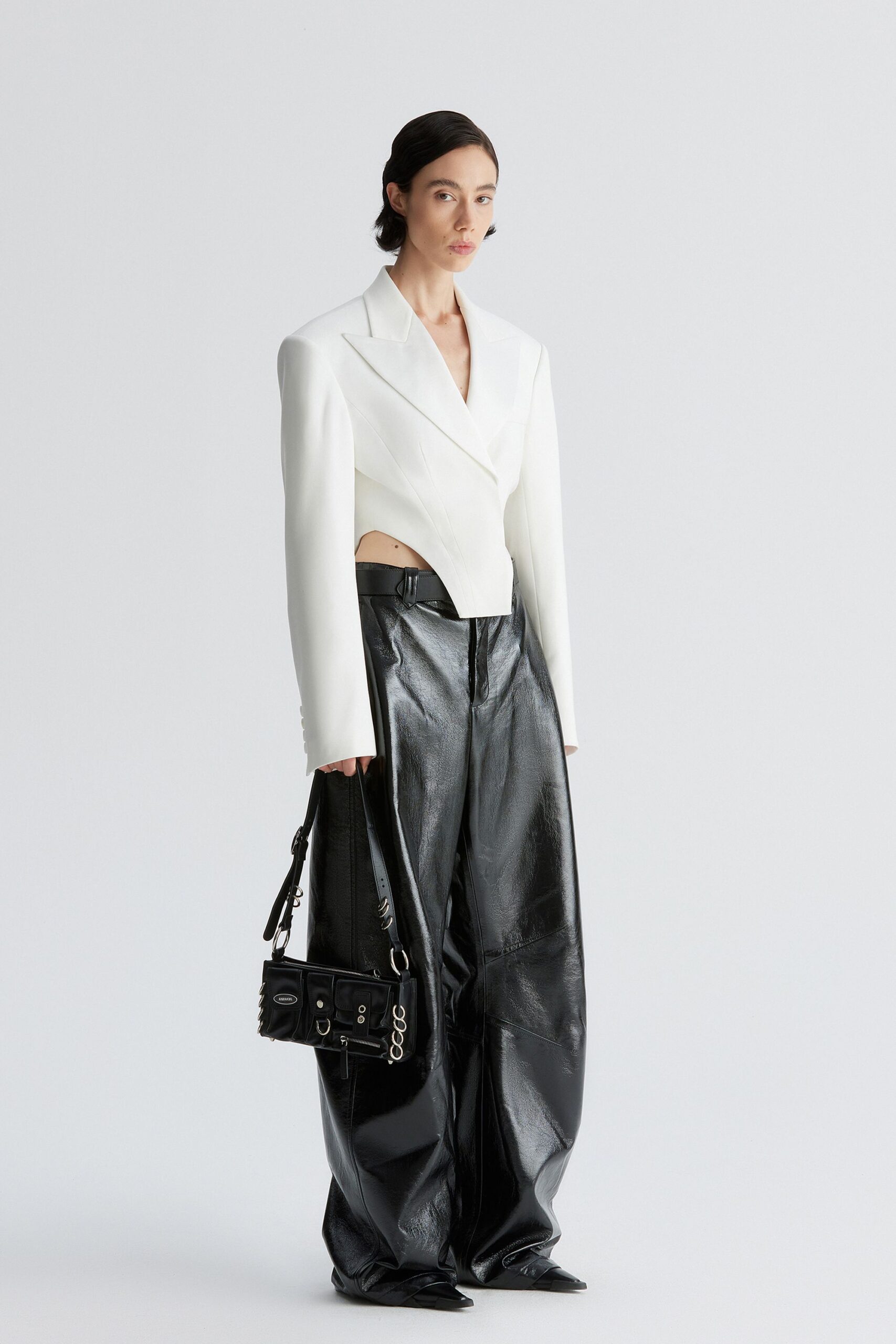 white structured blazer black leather pants