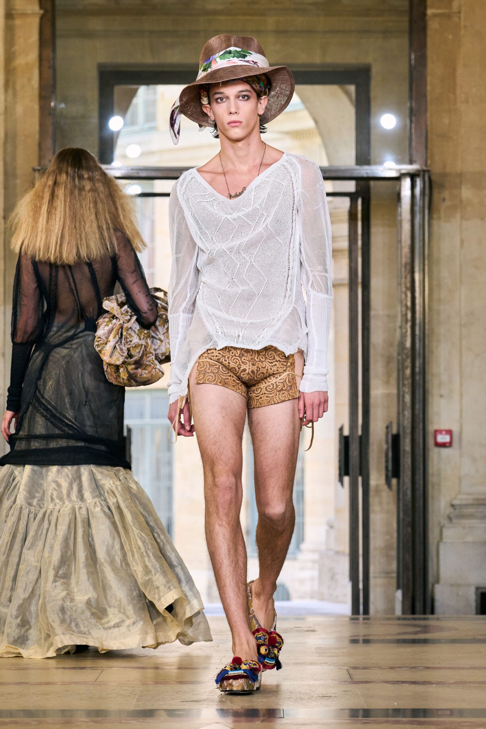 white relaxed top with brown shorts