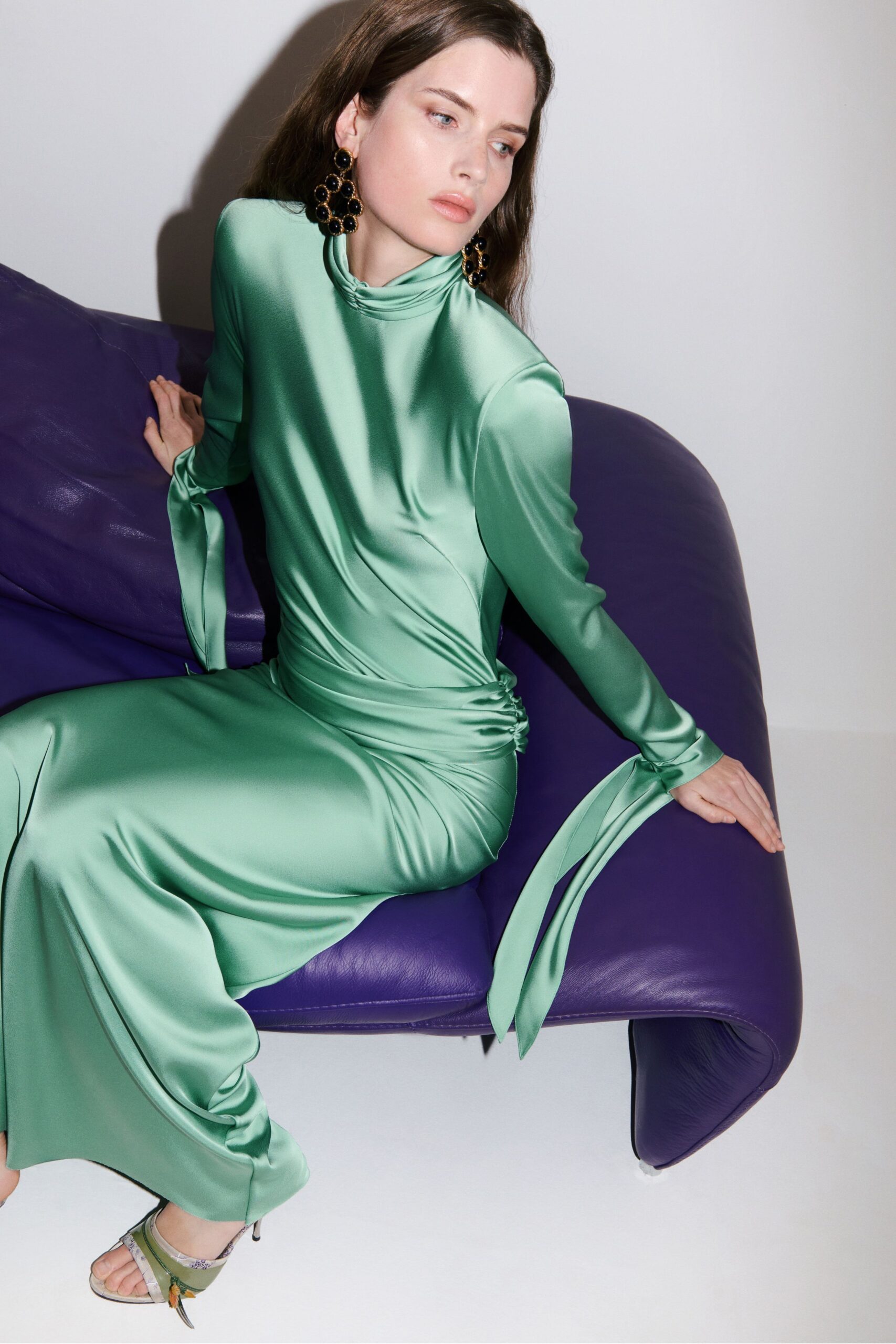 green silk long-sleeve high-neck fitted ruched shiny dress