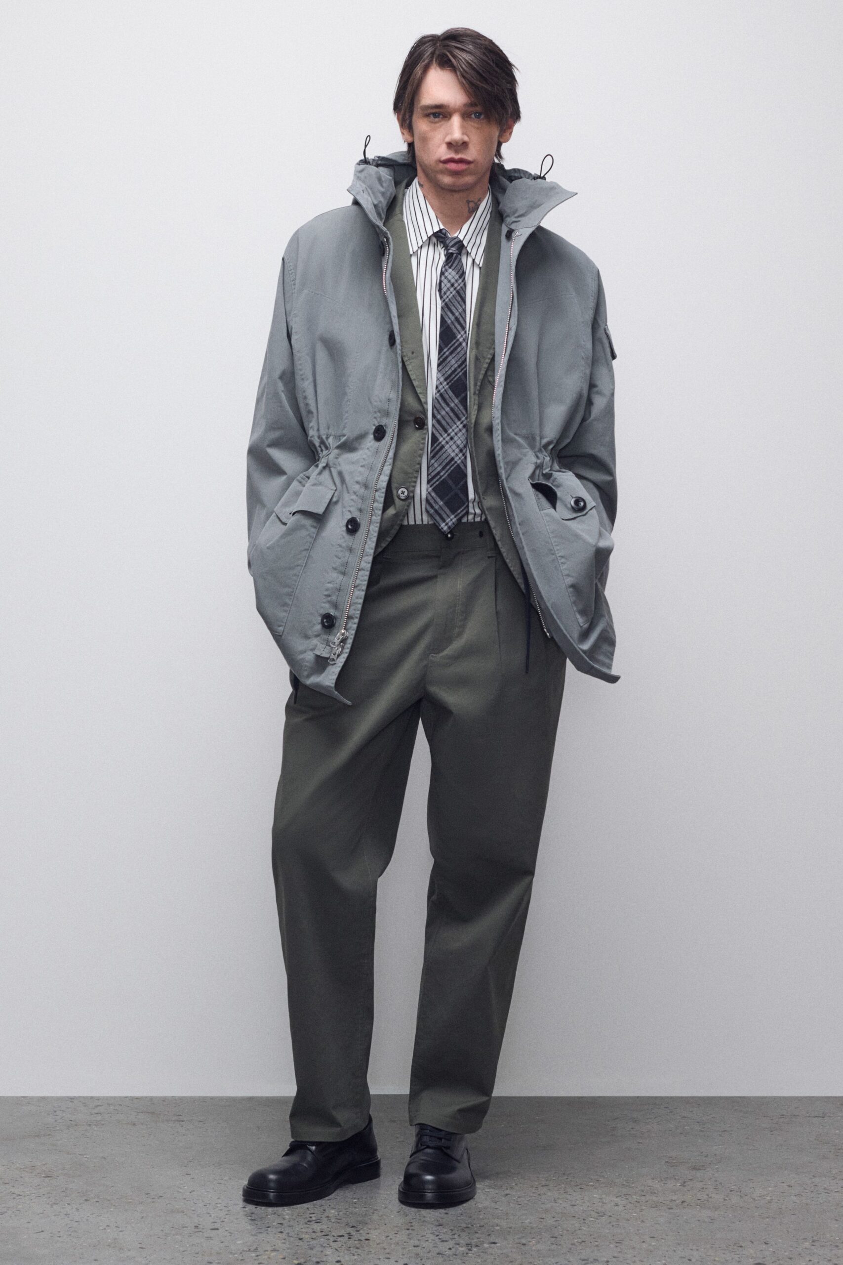 gray jacket with striped shirt