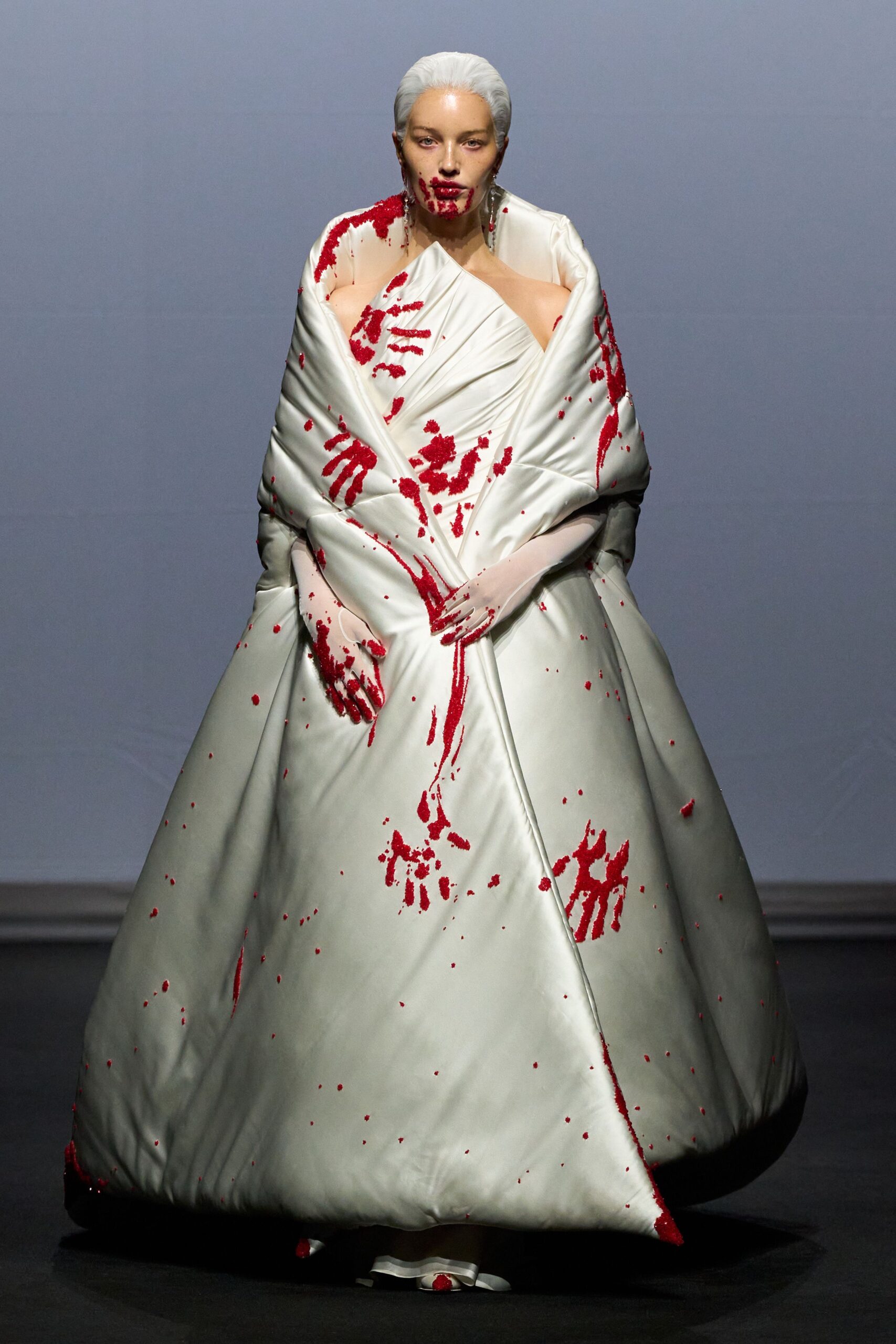 white silk sleeveless gown