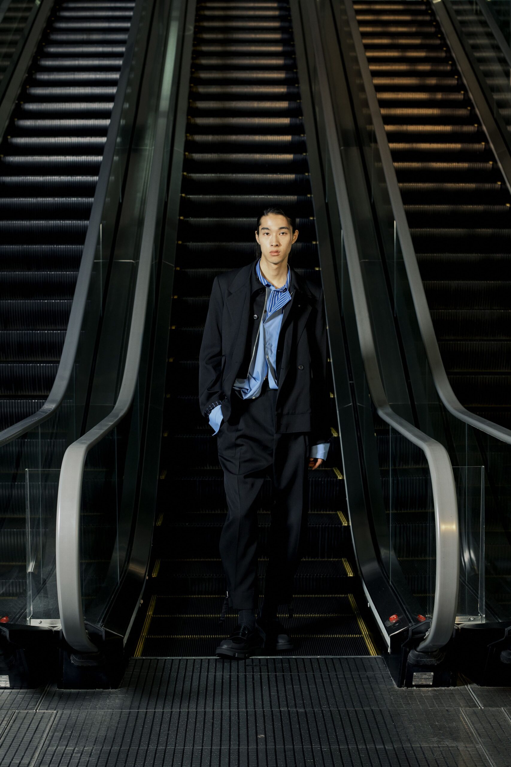 black jacket blue shirt tailored pants