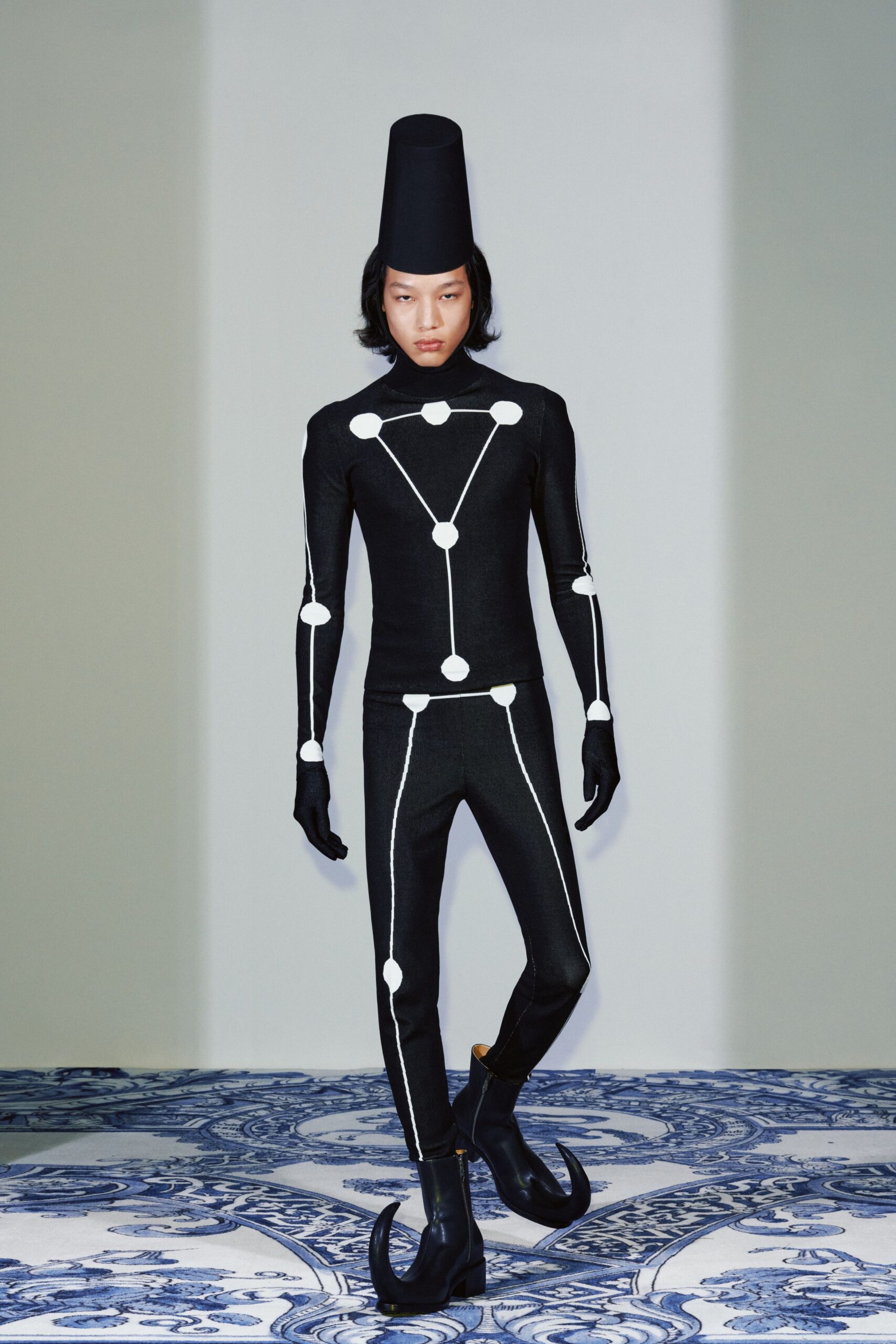 black cotton long-sleeve high-neck fitted printed catsuit