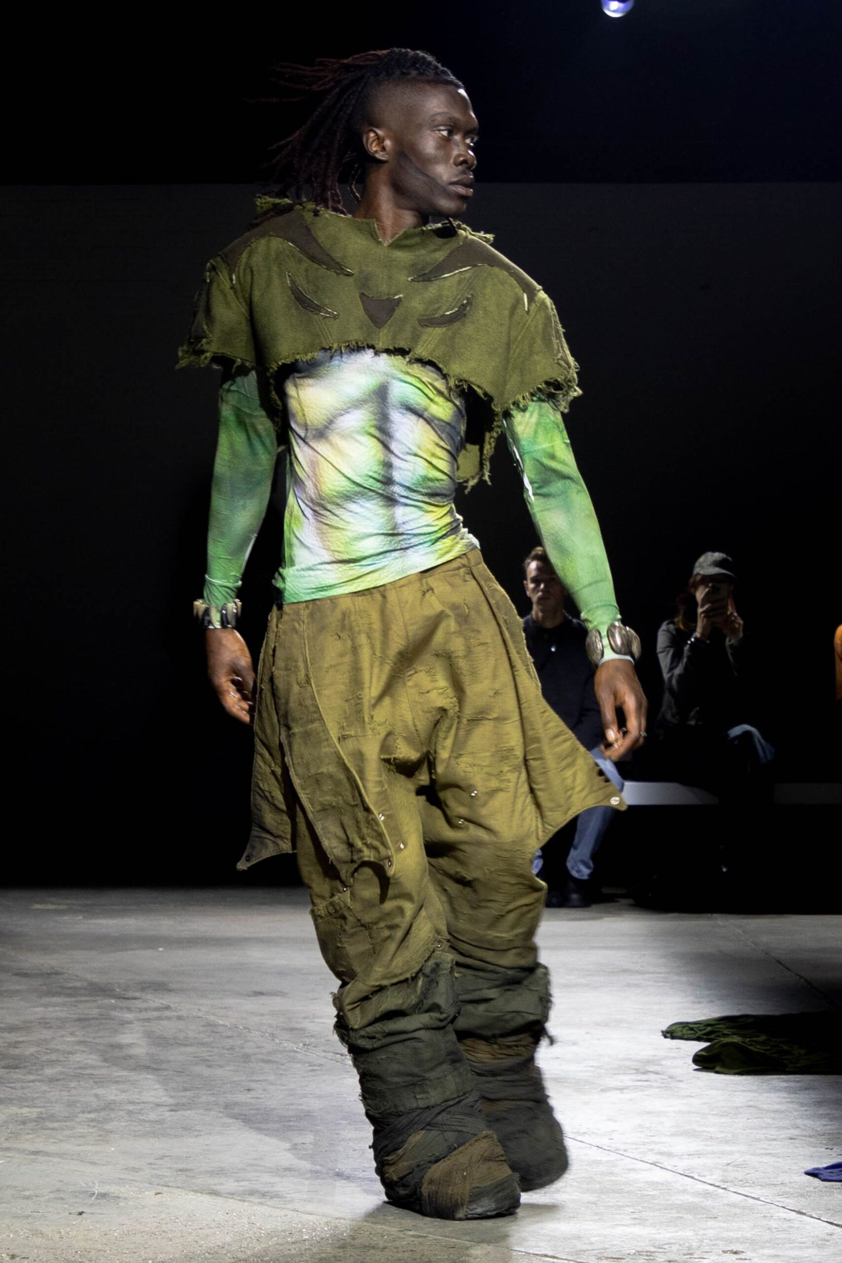 green layered top with cargo pants