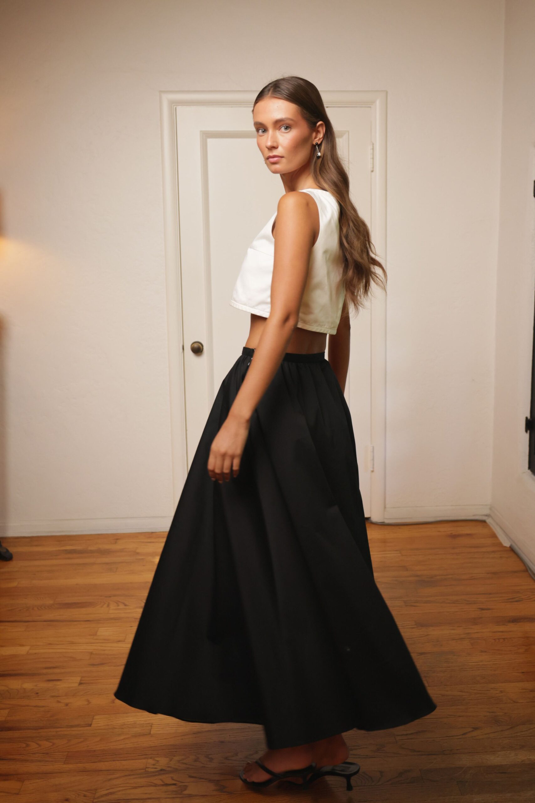 white cropped top black maxi skirt