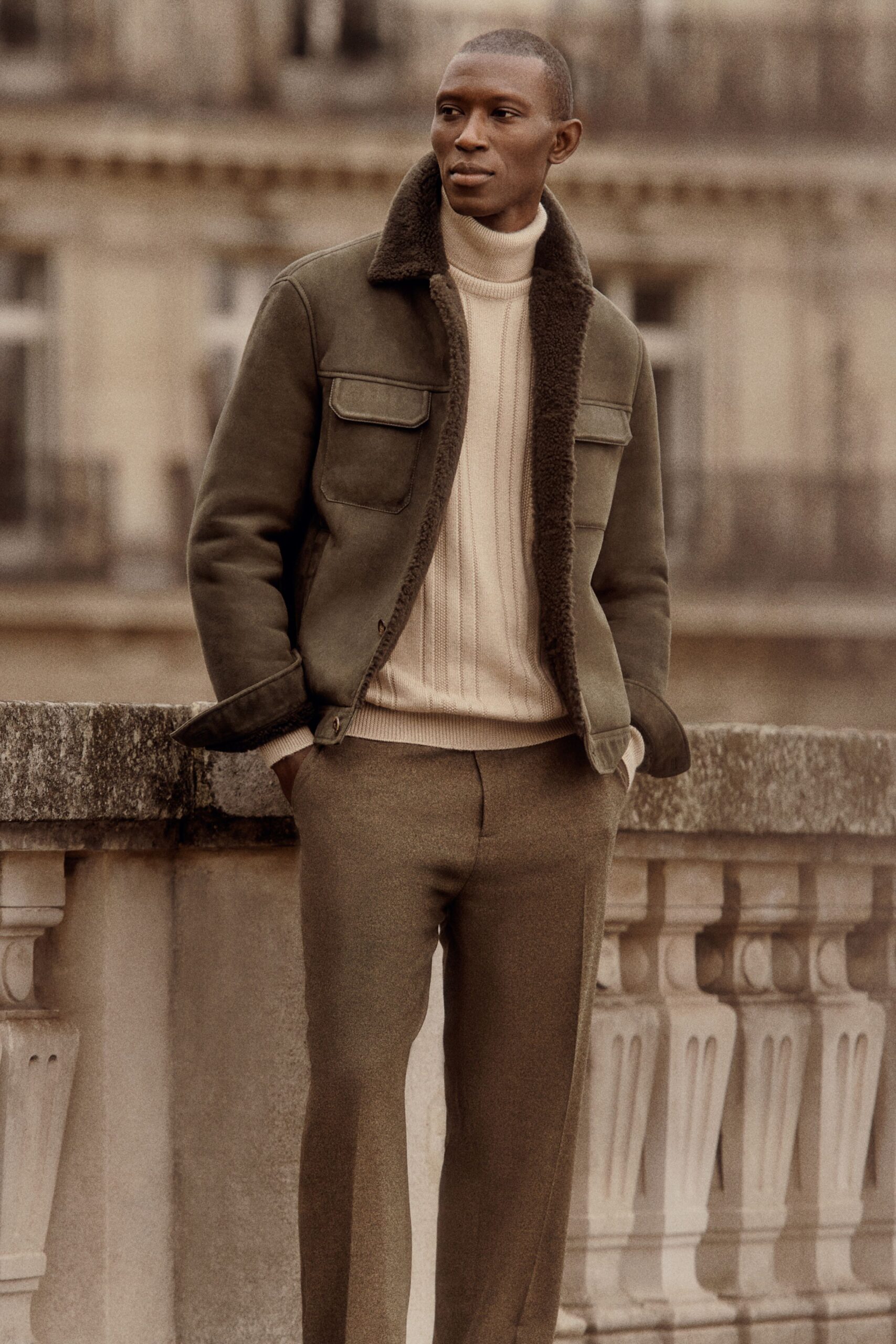 green wool long-sleeve collared structured buttoned jacket