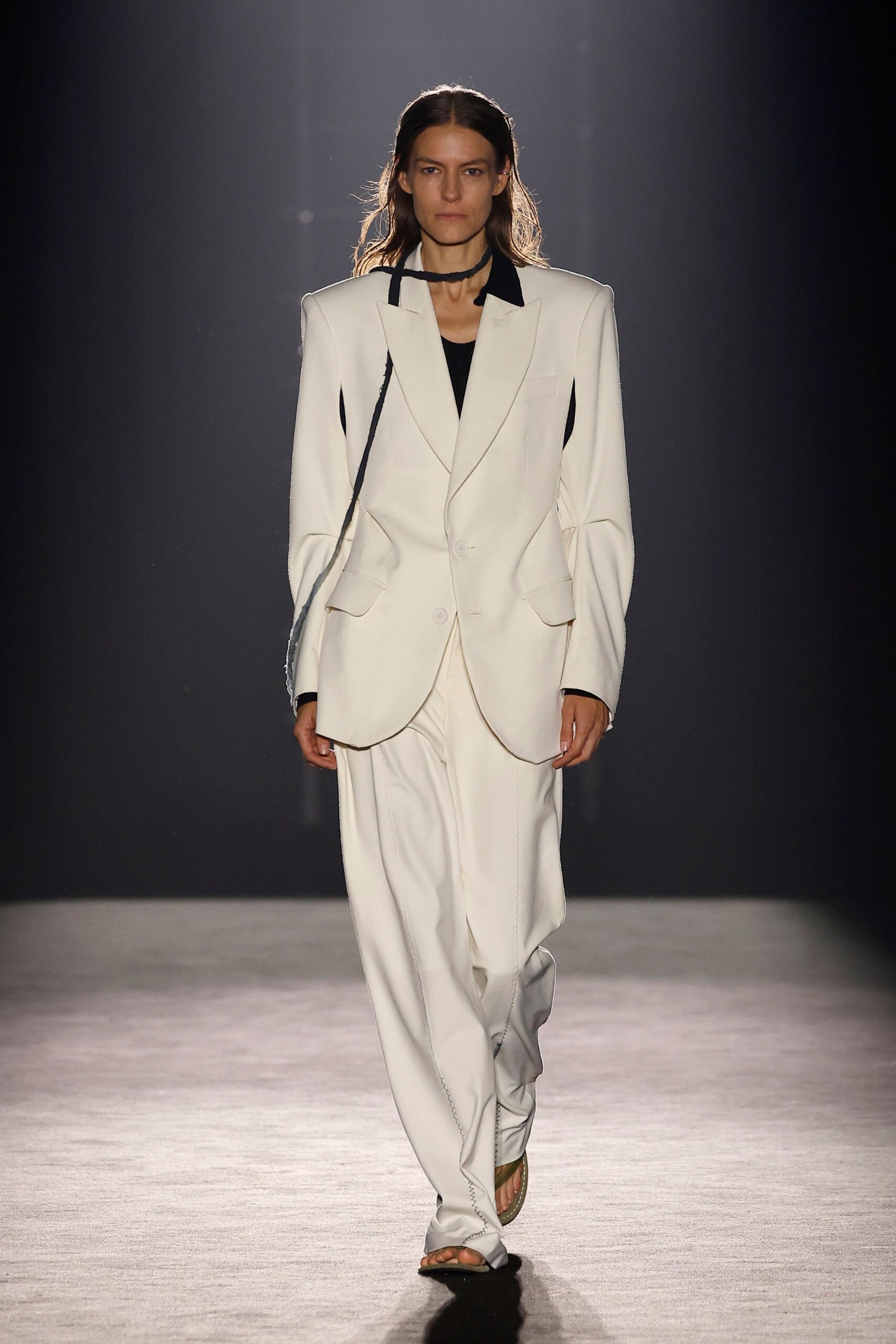 white tailored suit with black top