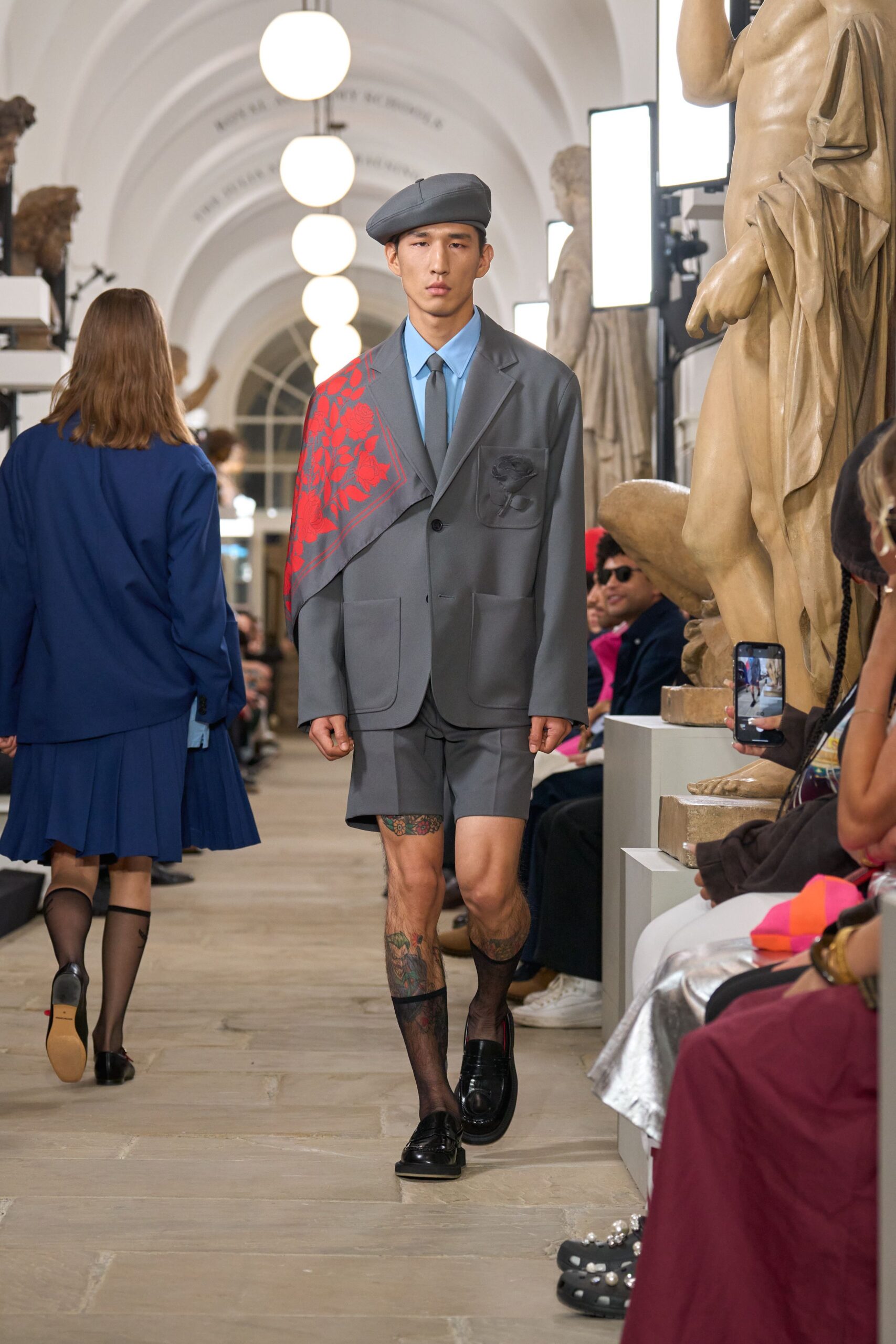 gray blazer with blue shirt and shorts