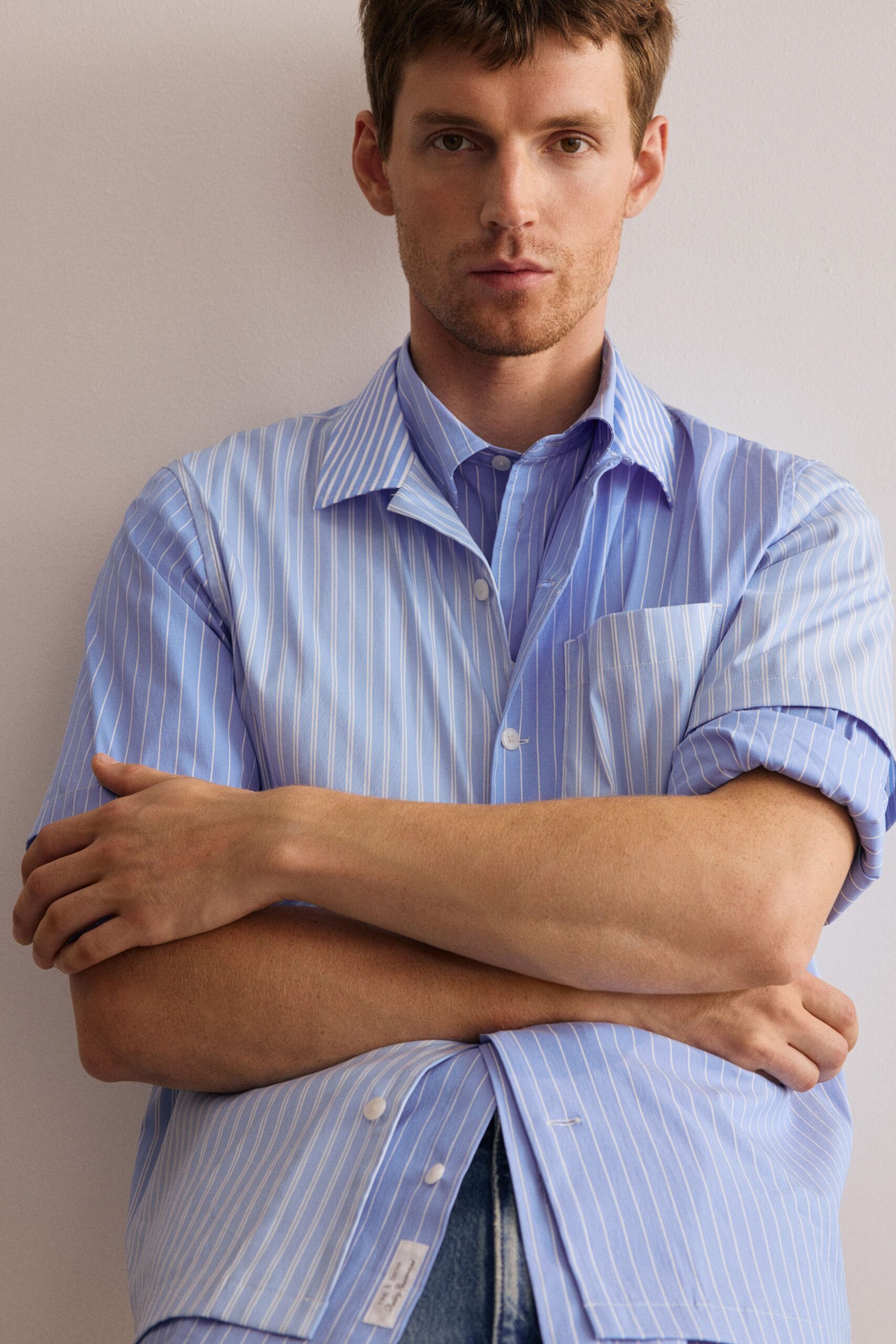 blue striped shirt with denim pants