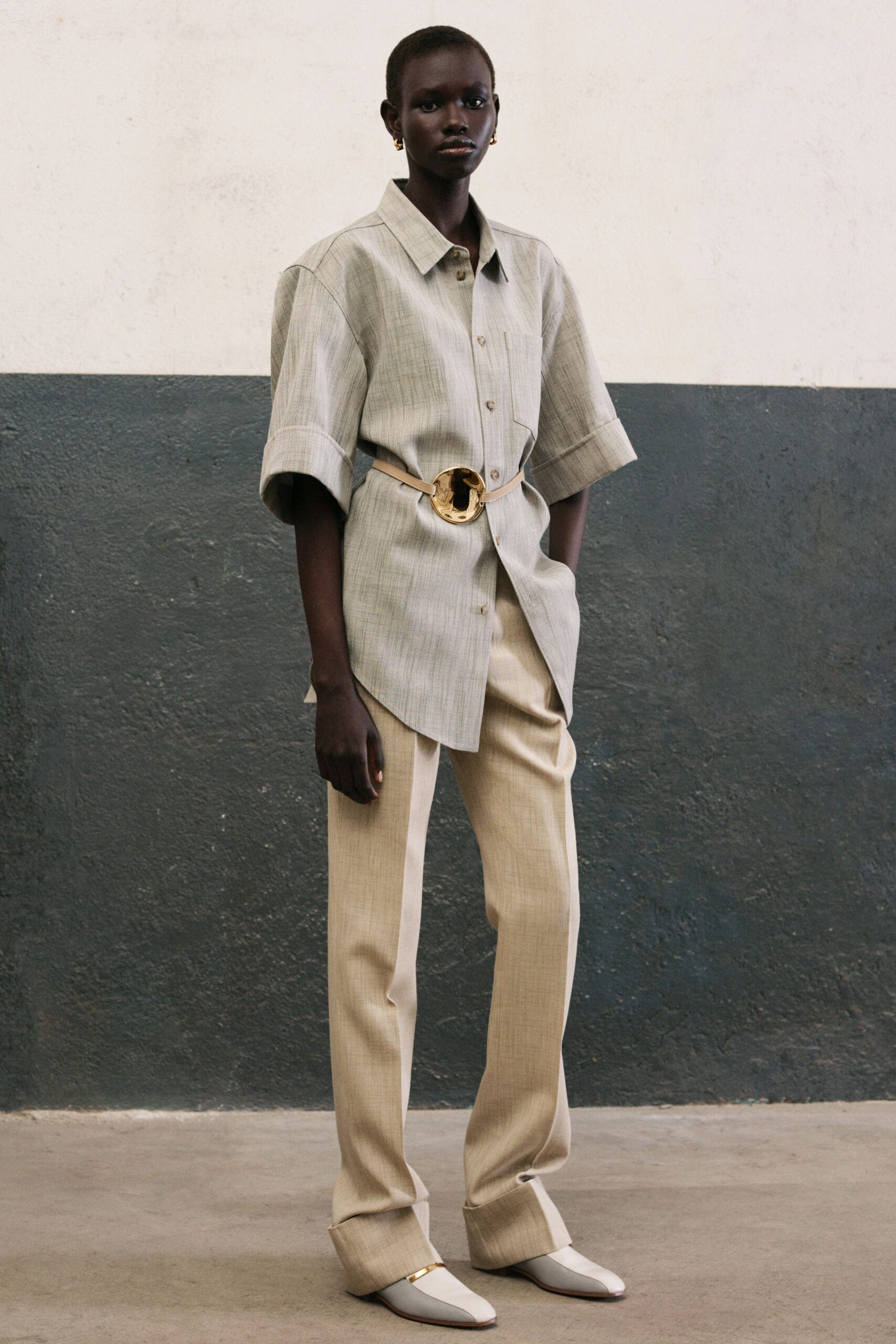 gray relaxed shirt beige tailored pants