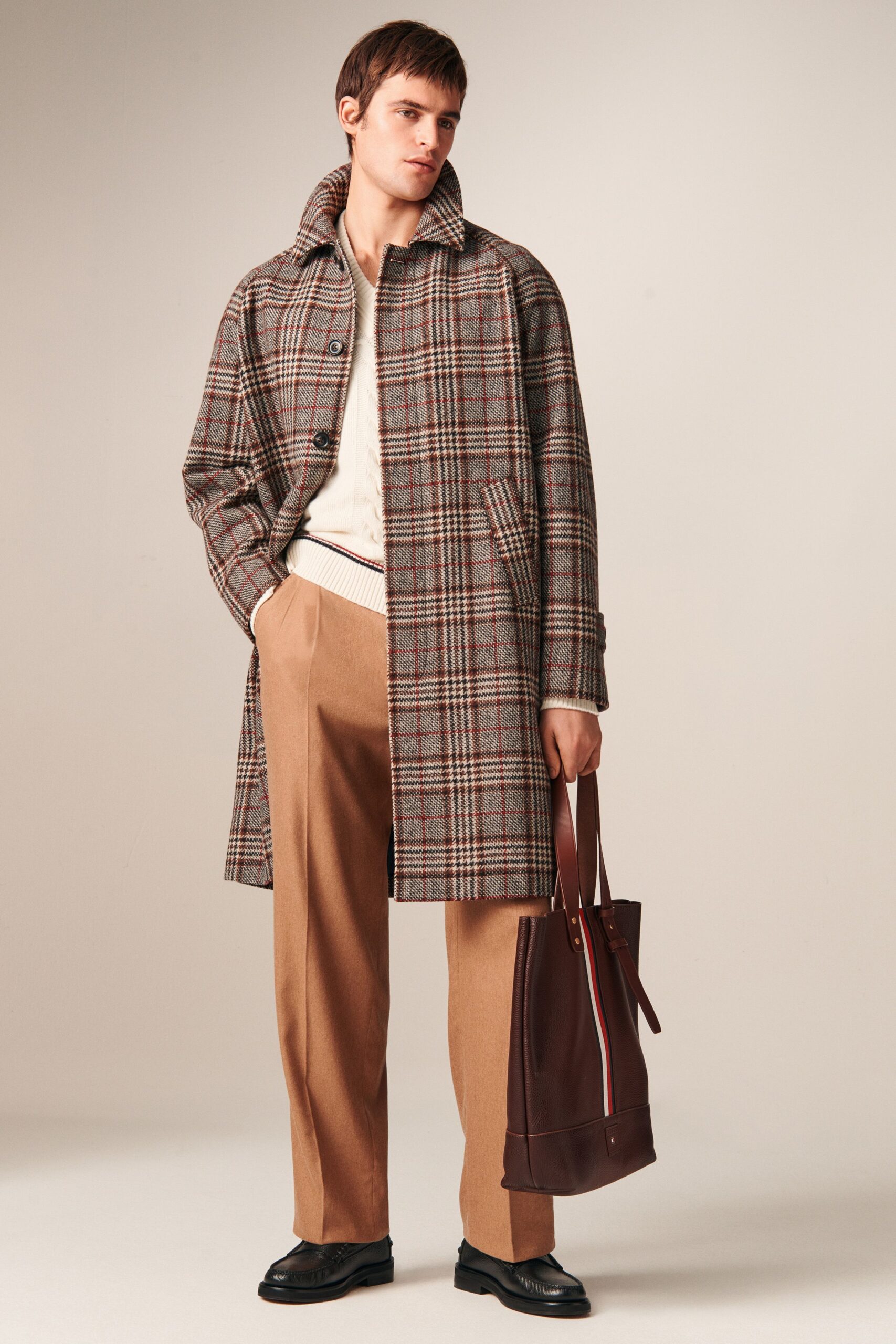 brown plaid coat with beige pants