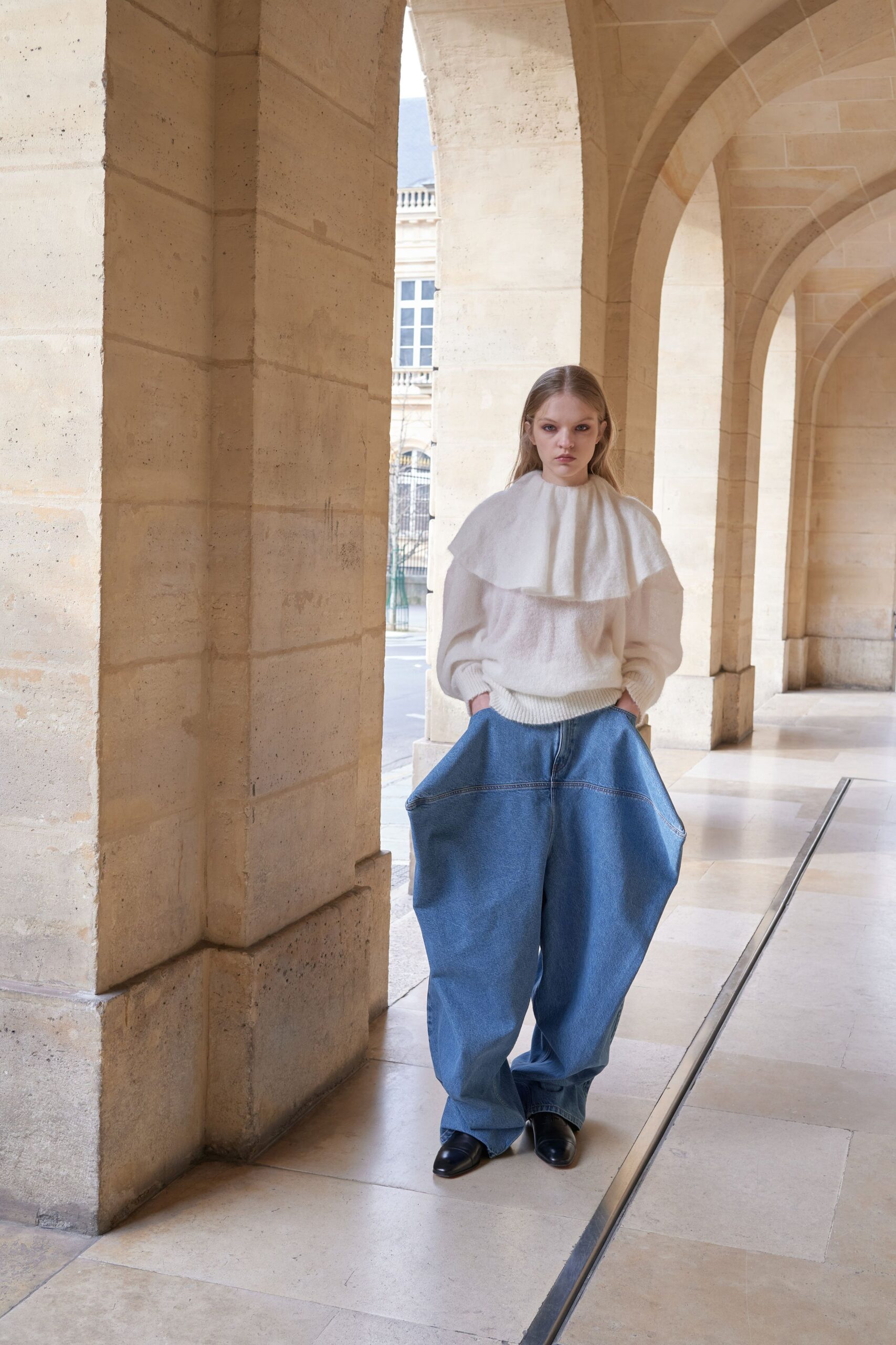 white wool long-sleeve high-neck relaxed draped sweater