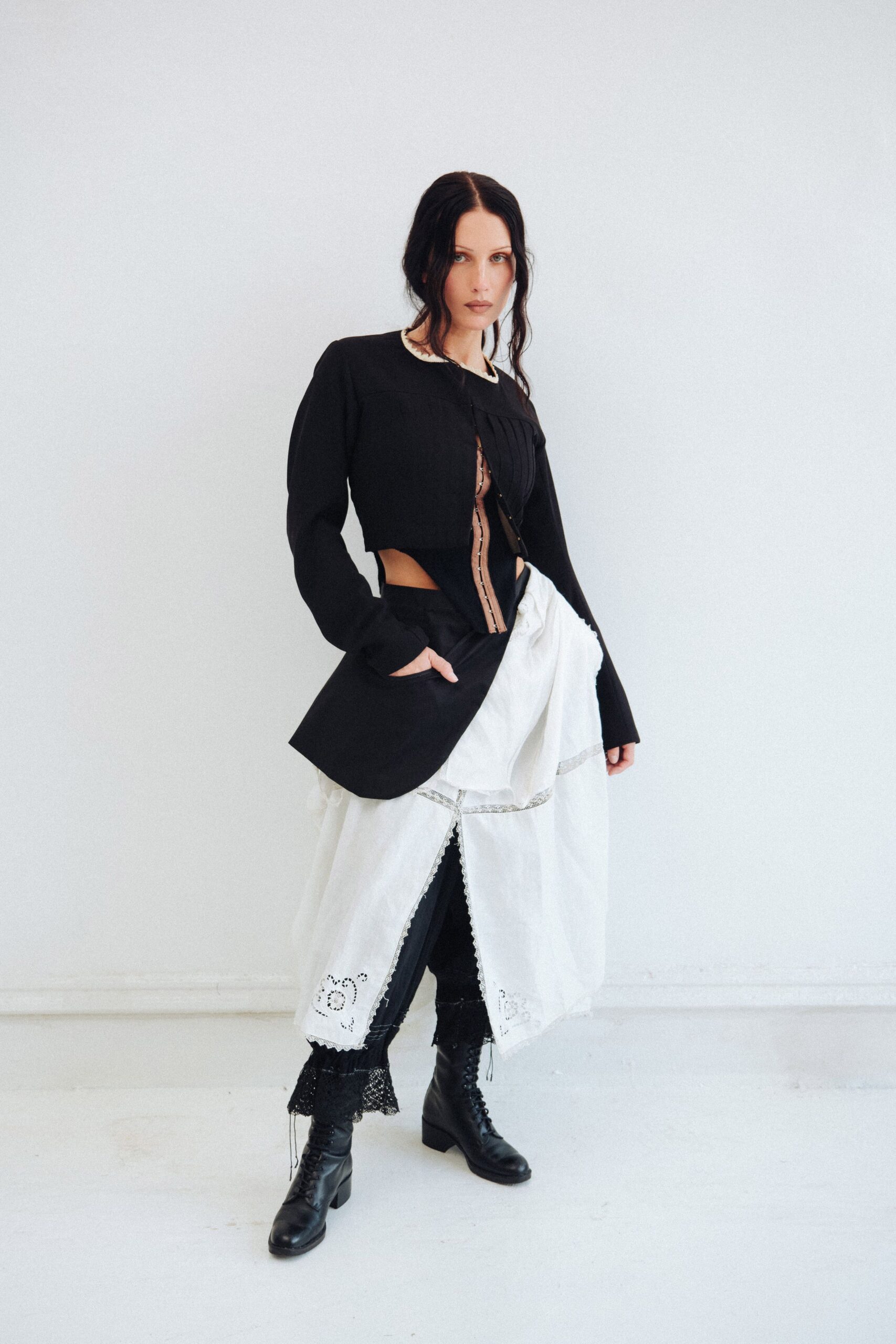 black fitted top with white layered skirt