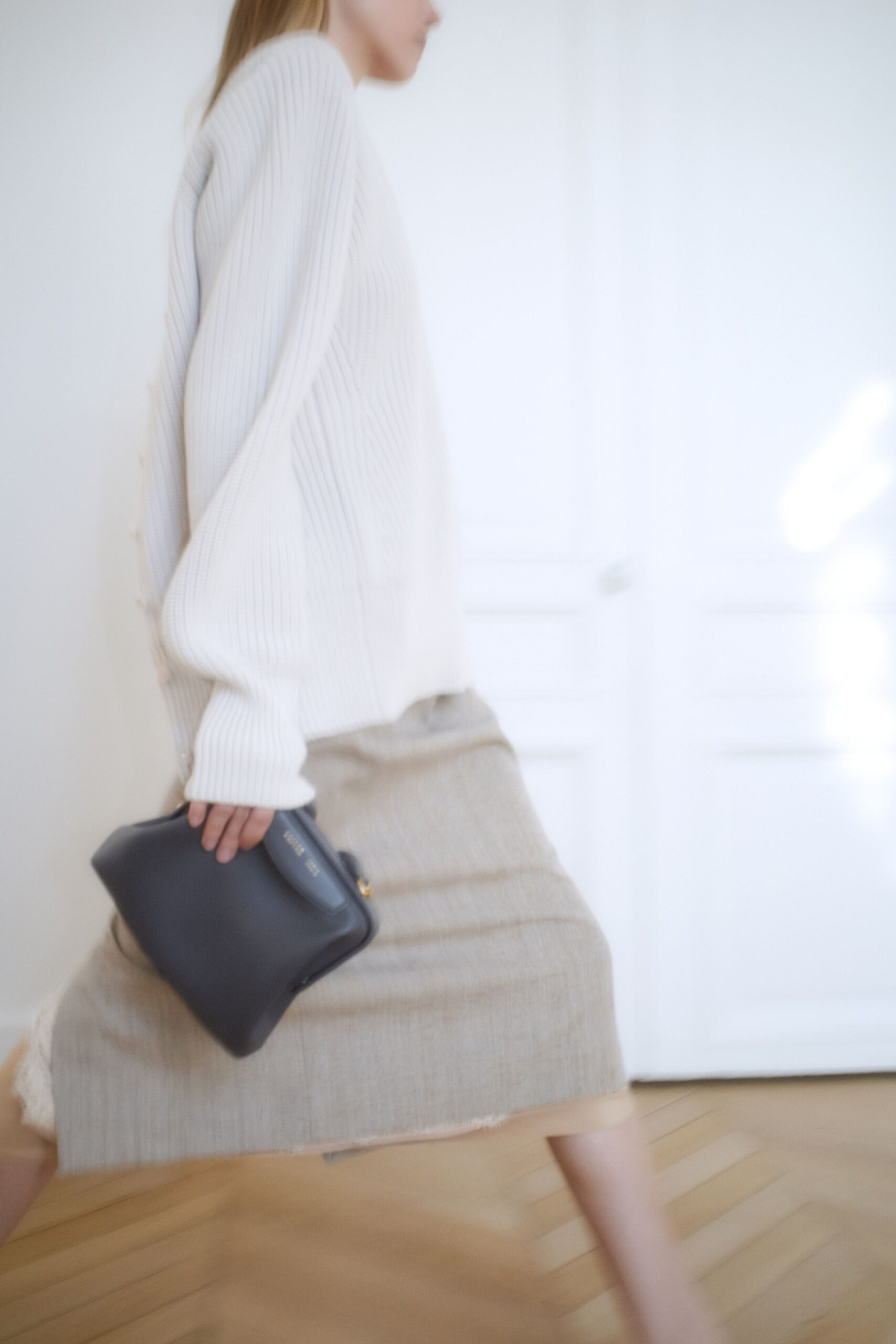 white relaxed sweater beige skirt