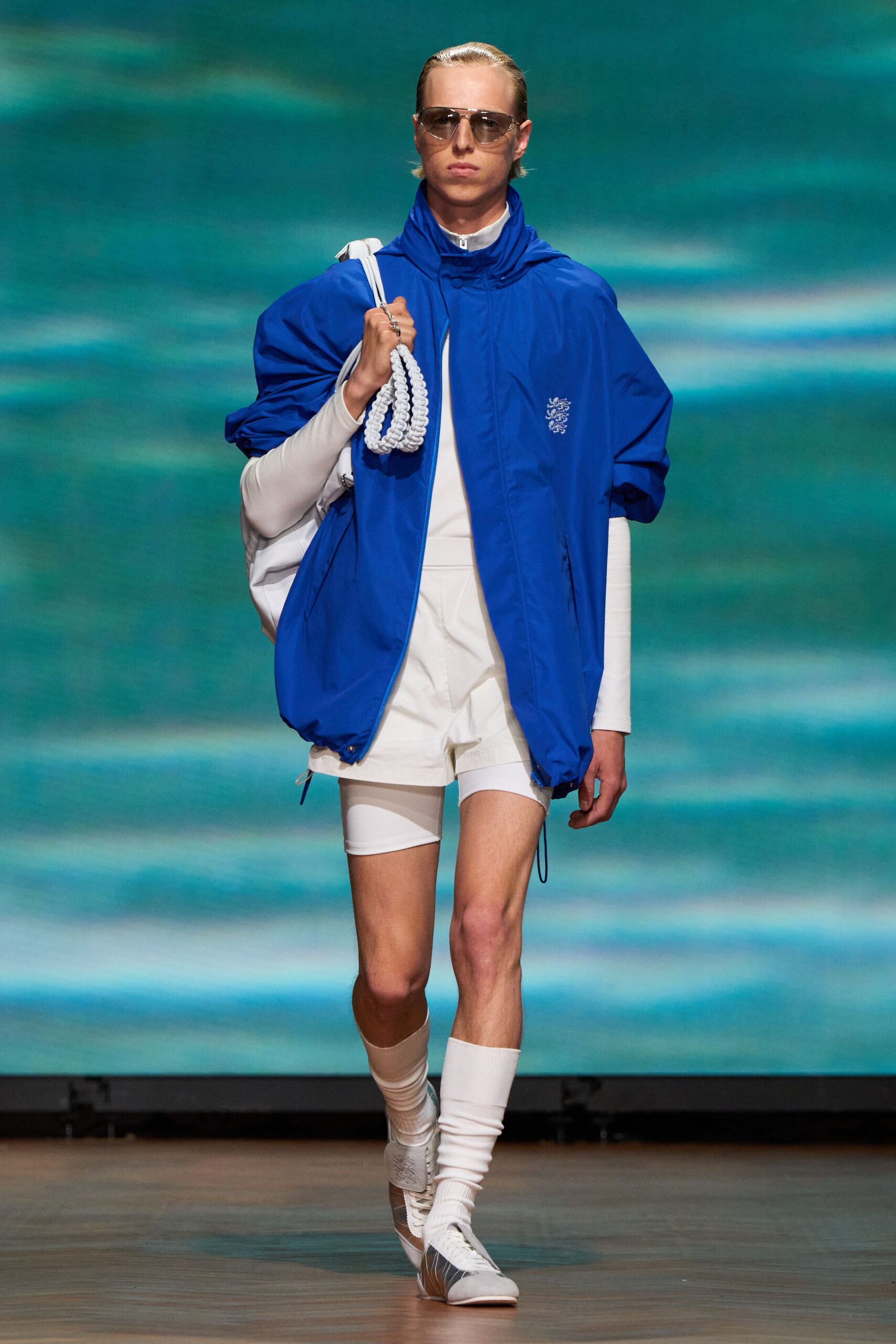 blue relaxed jacket with white shorts