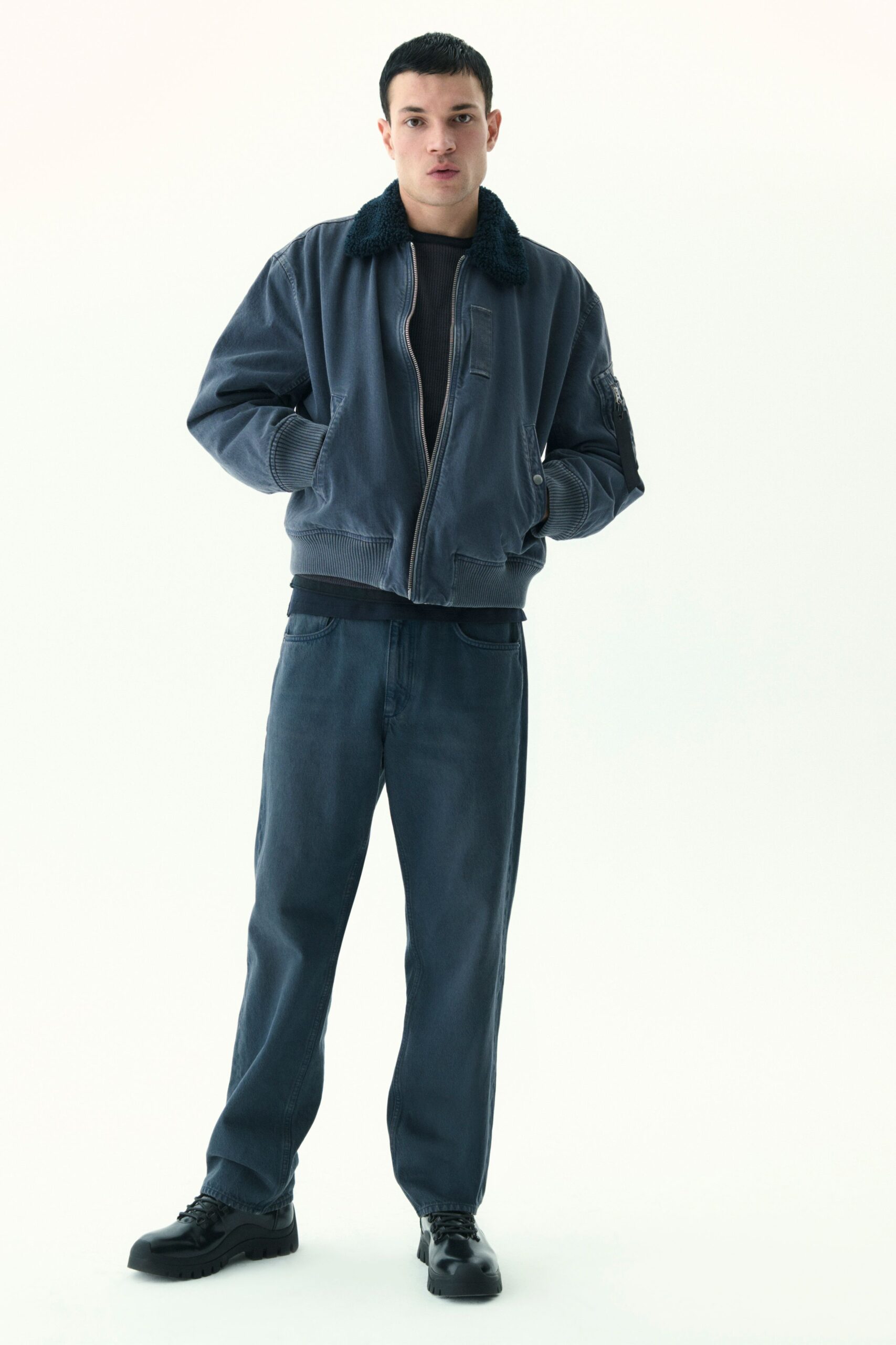 blue relaxed jacket with denim pants