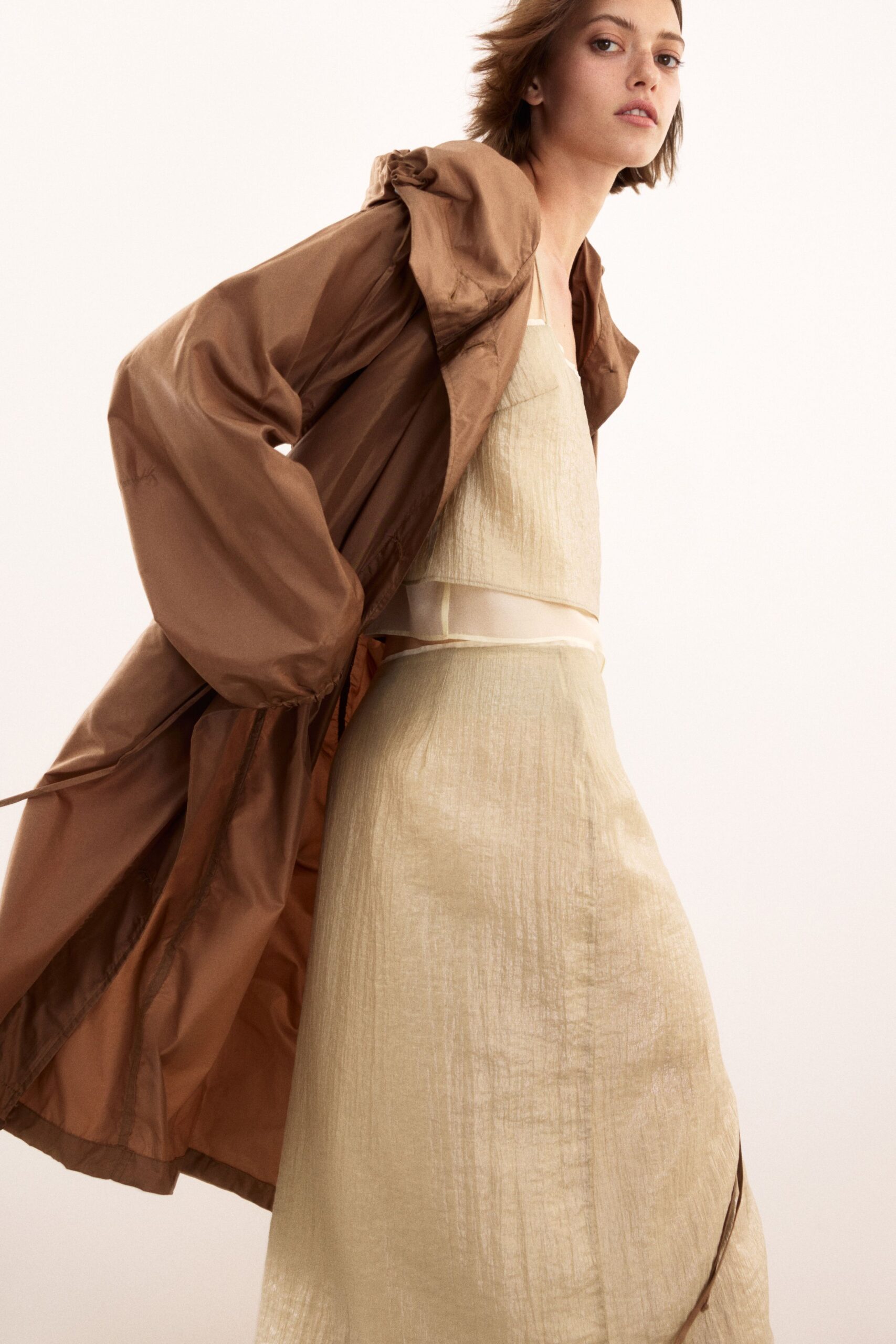 brown silk coat and beige dress