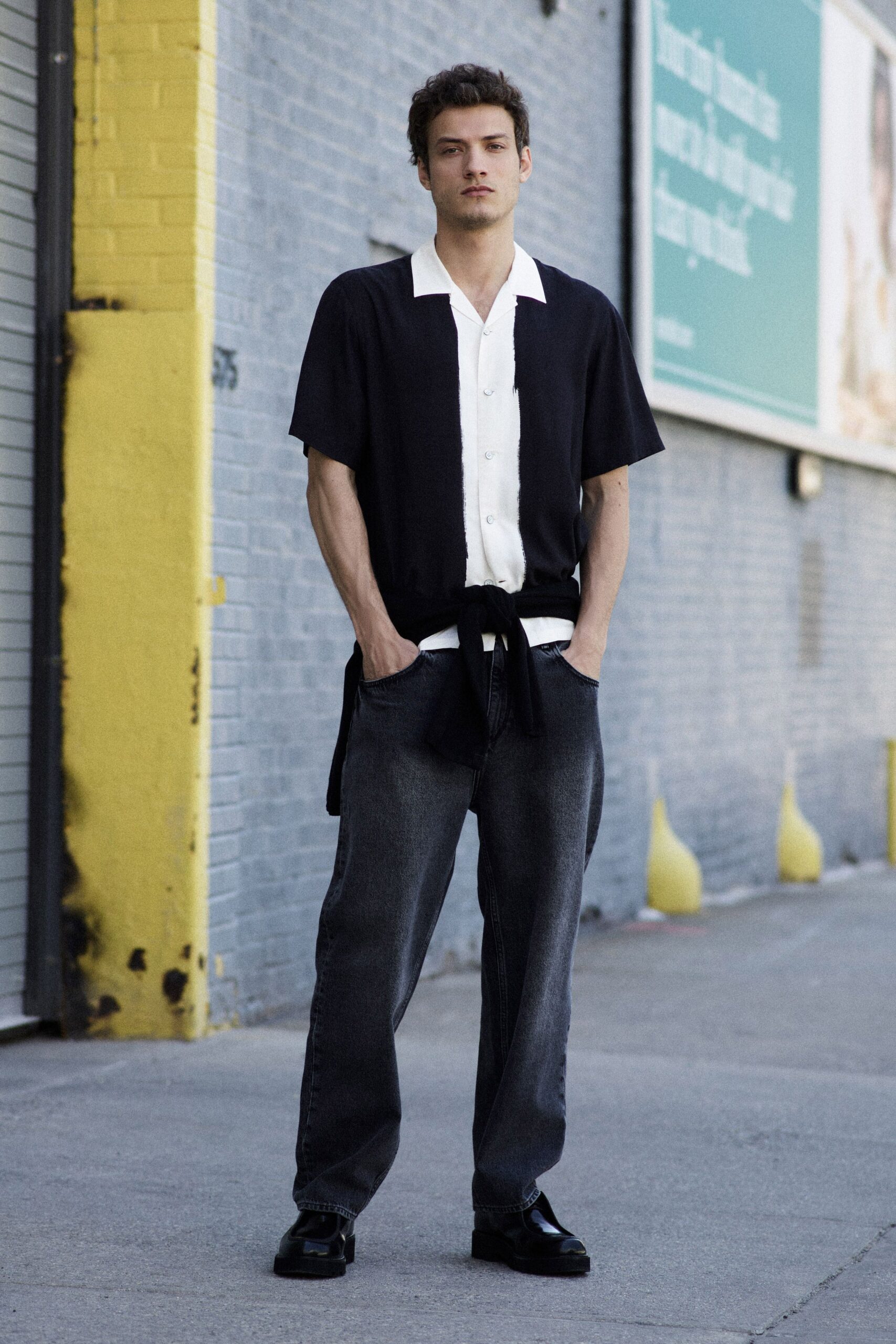 black and white relaxed shirt with gray pants