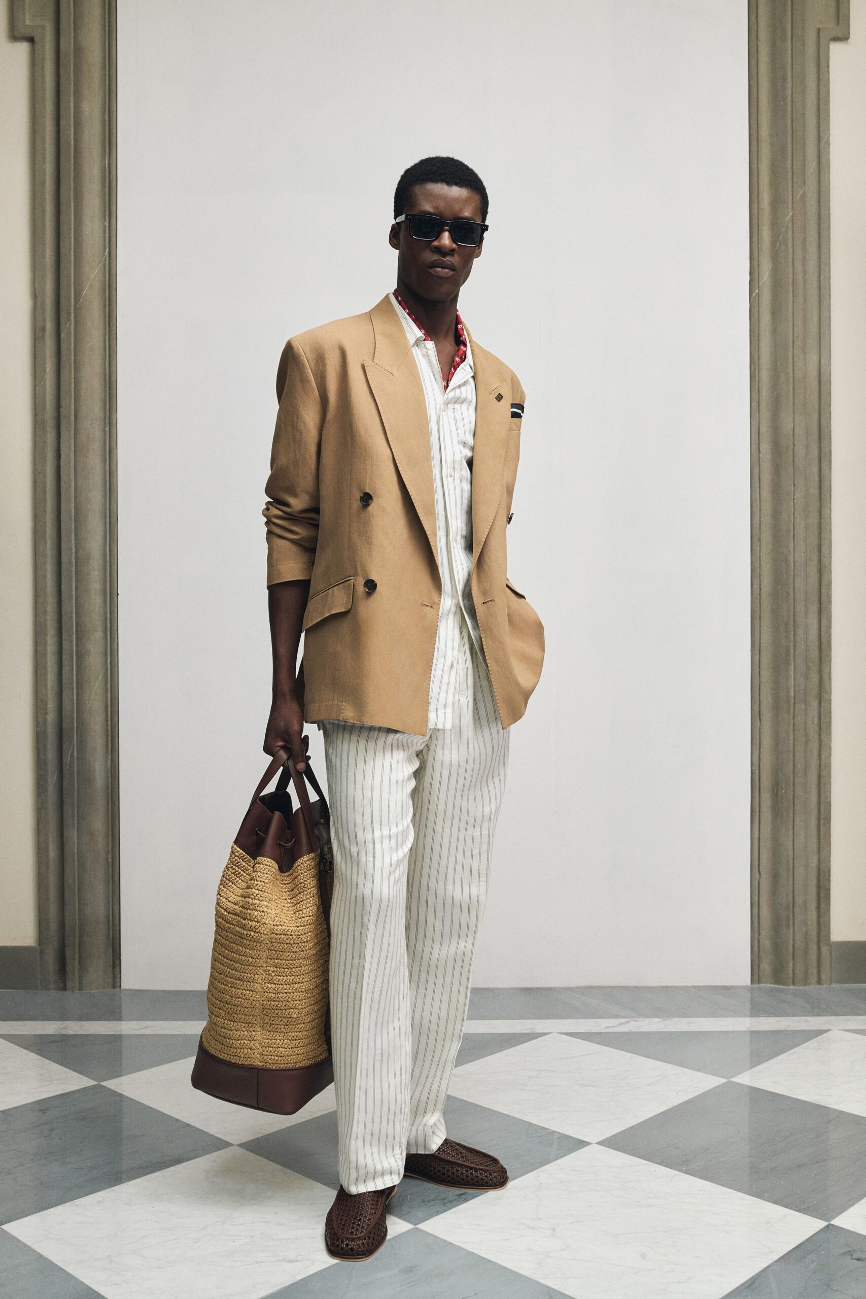 beige tailored blazer with striped pants