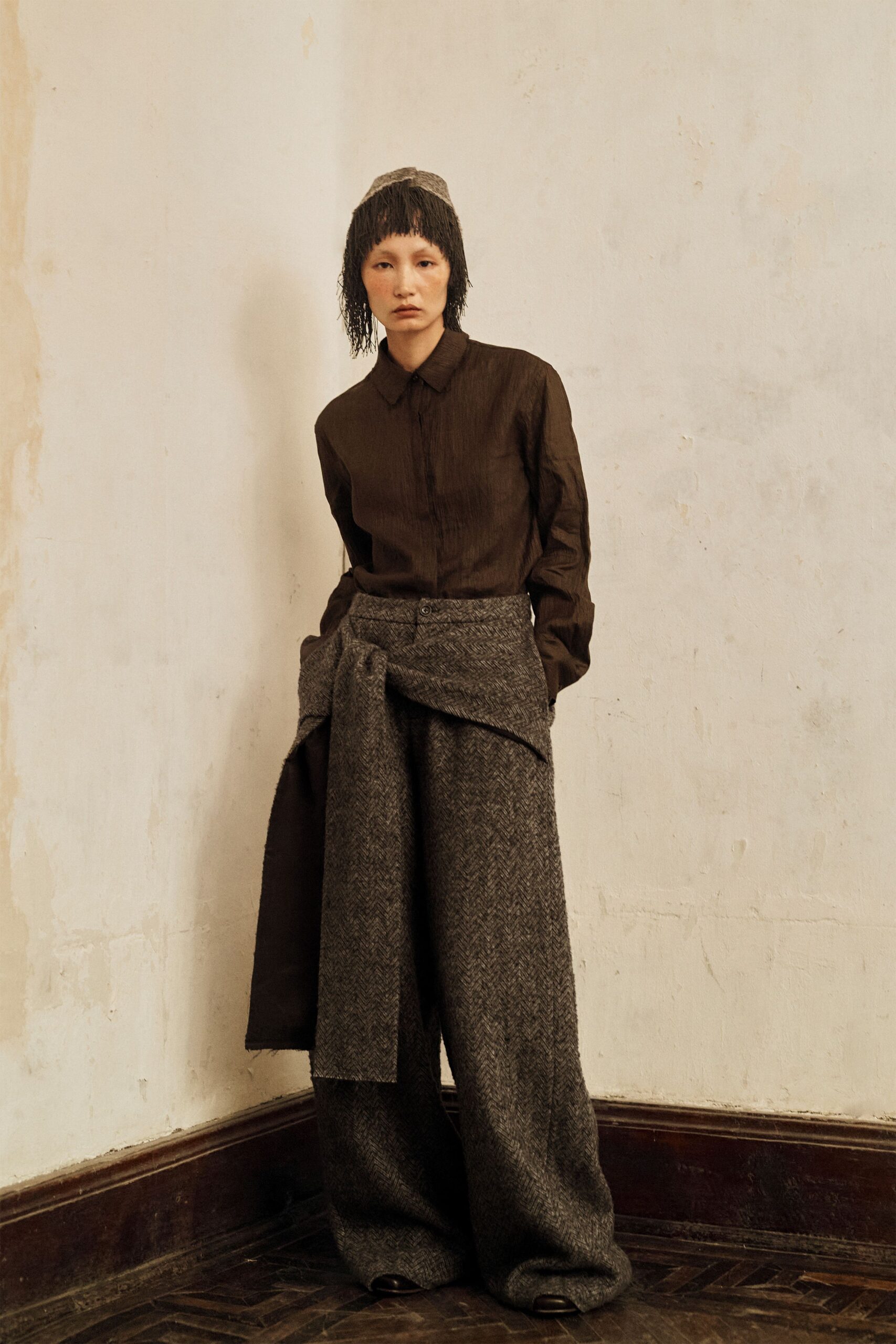 brown shirt gray wide-leg pants