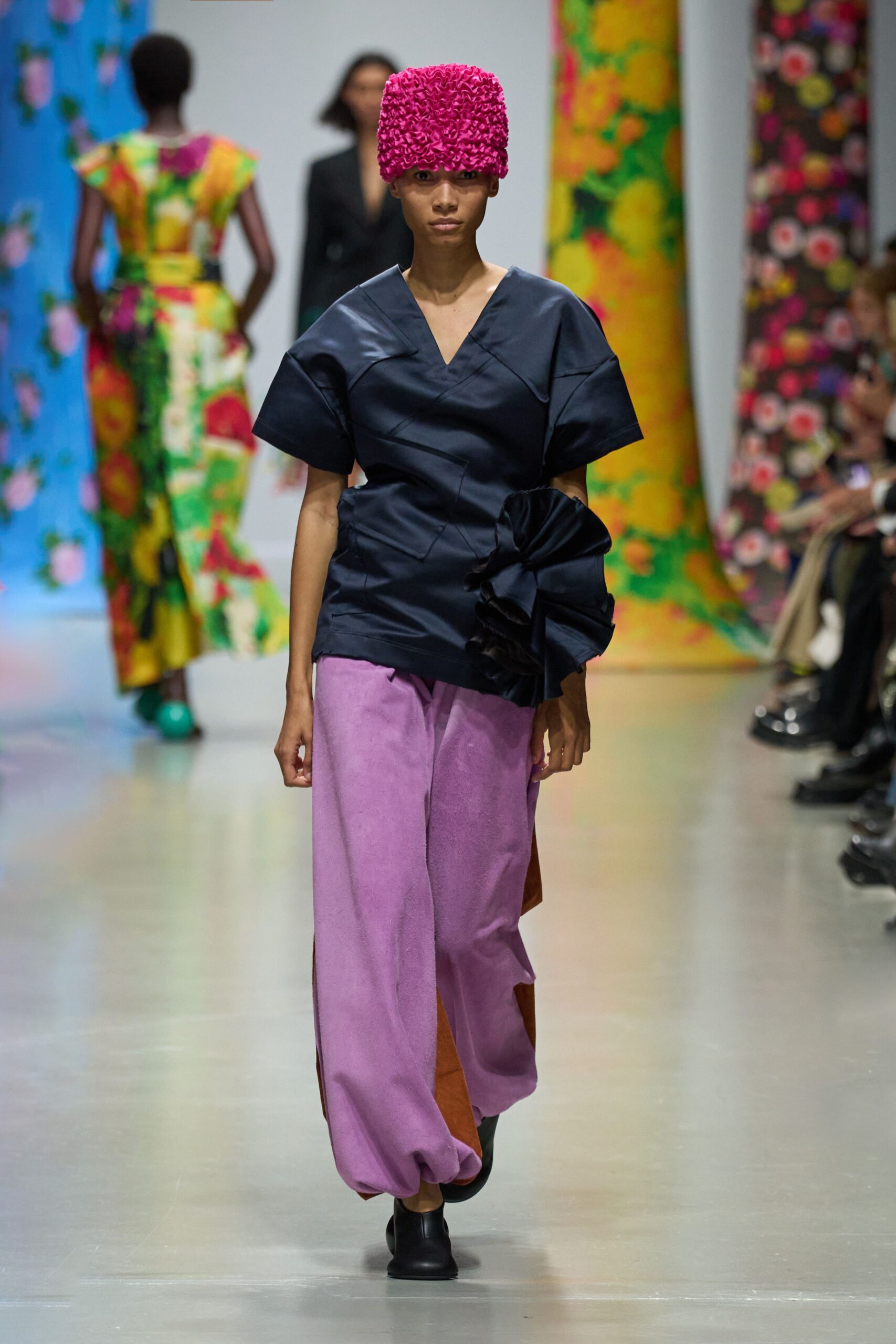 navy top with pink pants