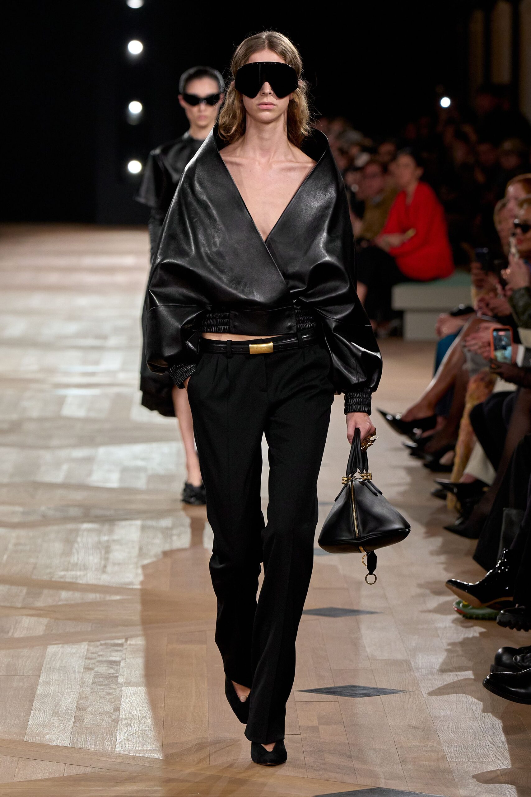 black leather fitted top and tailored pants