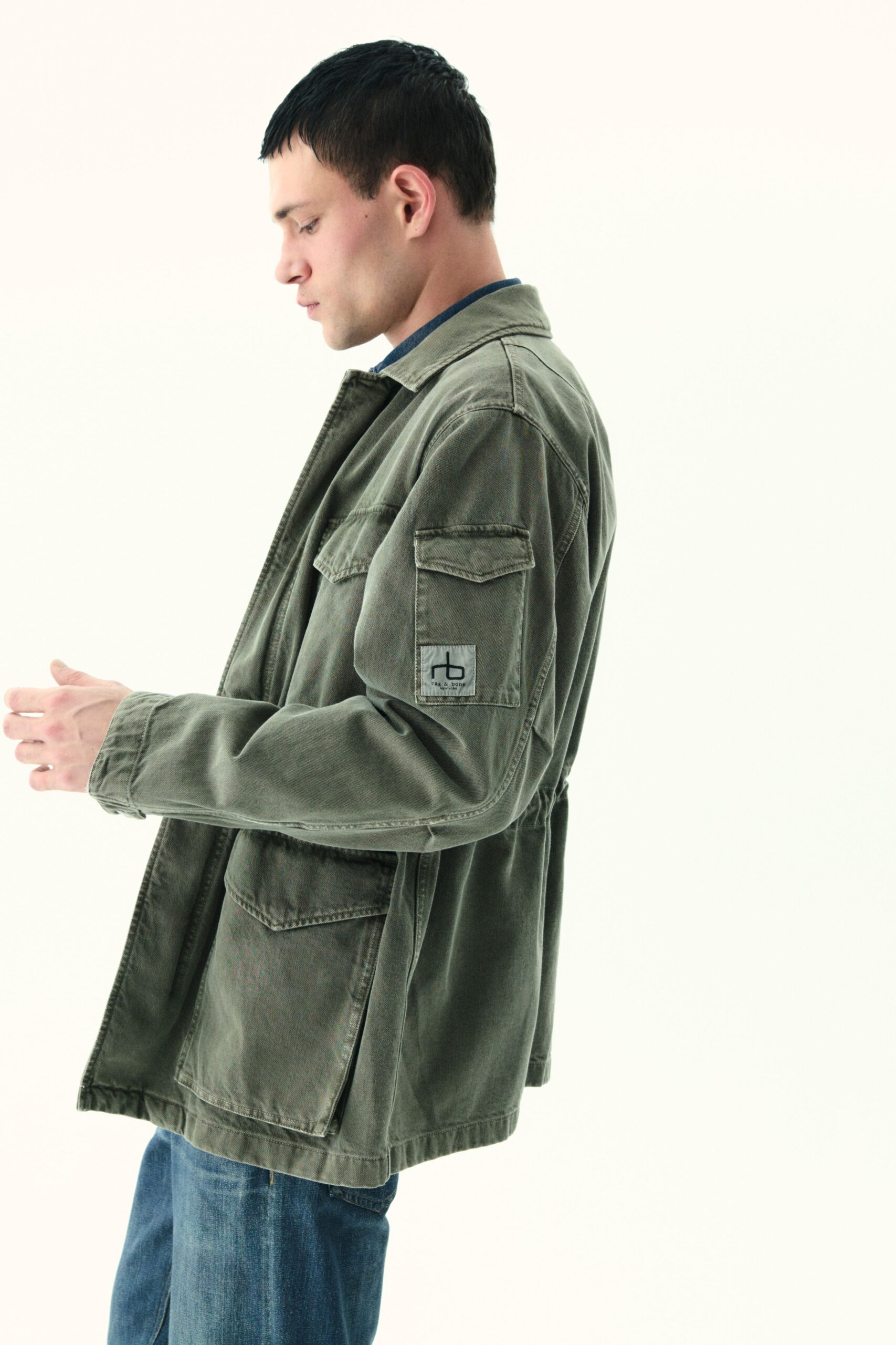 green cotton long-sleeve collared relaxed buttoned pockets jacket