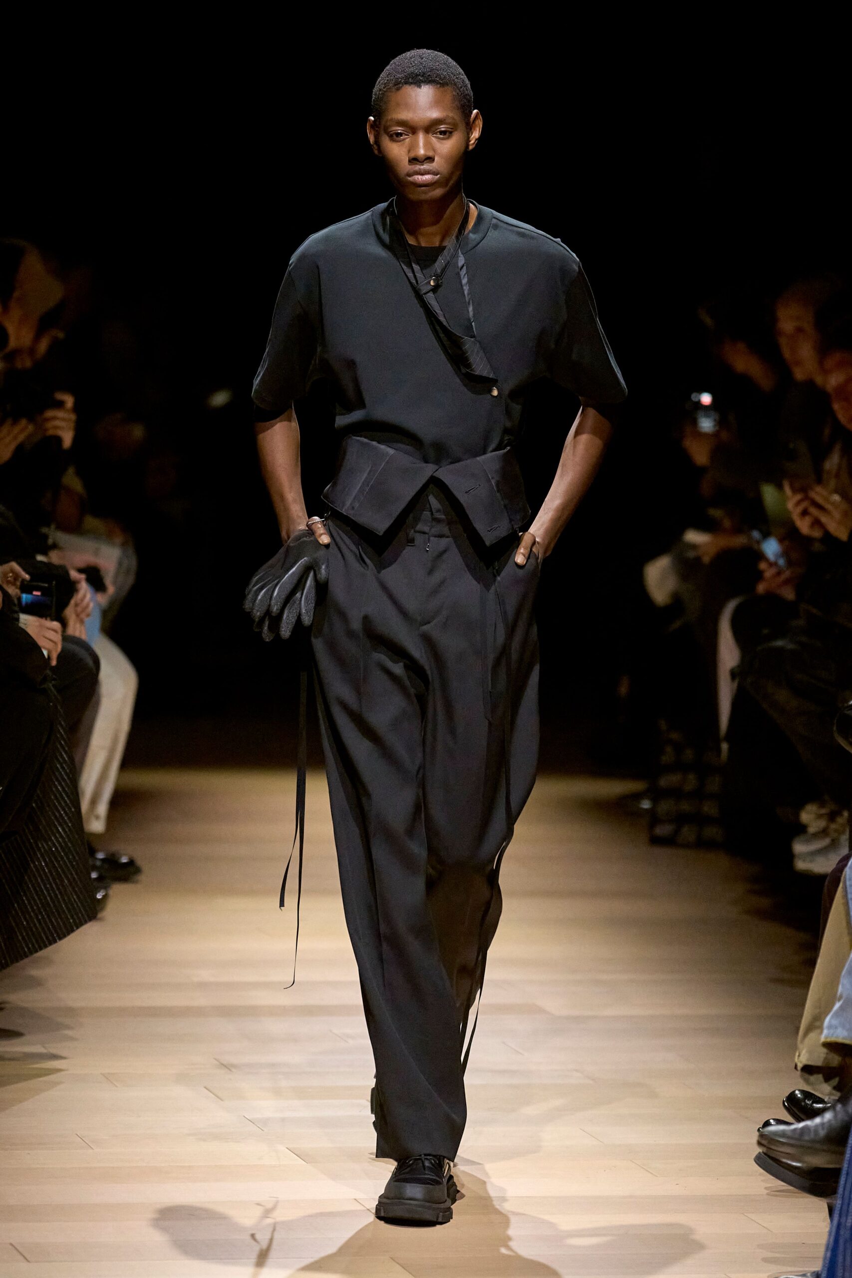 black fitted top and relaxed pants