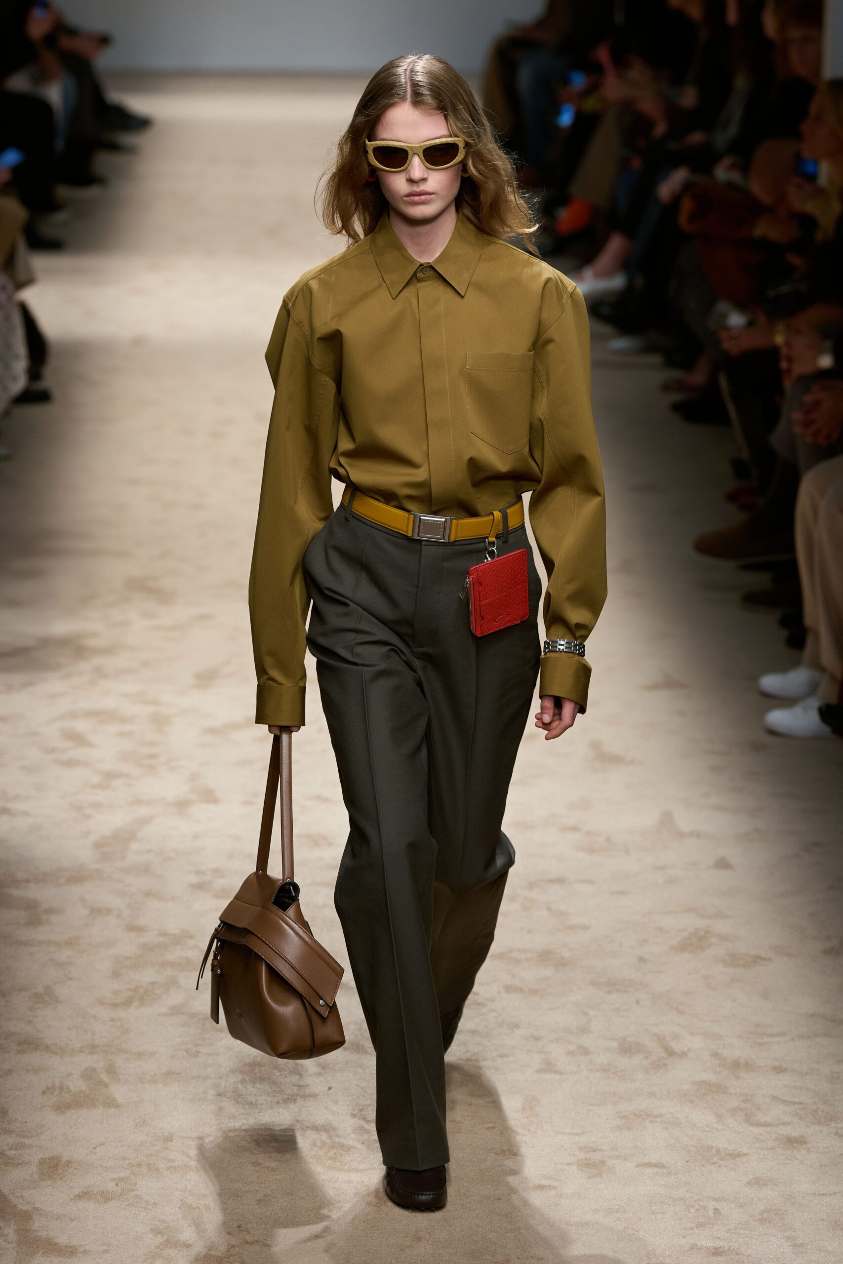 green relaxed shirt with gray tailored pants