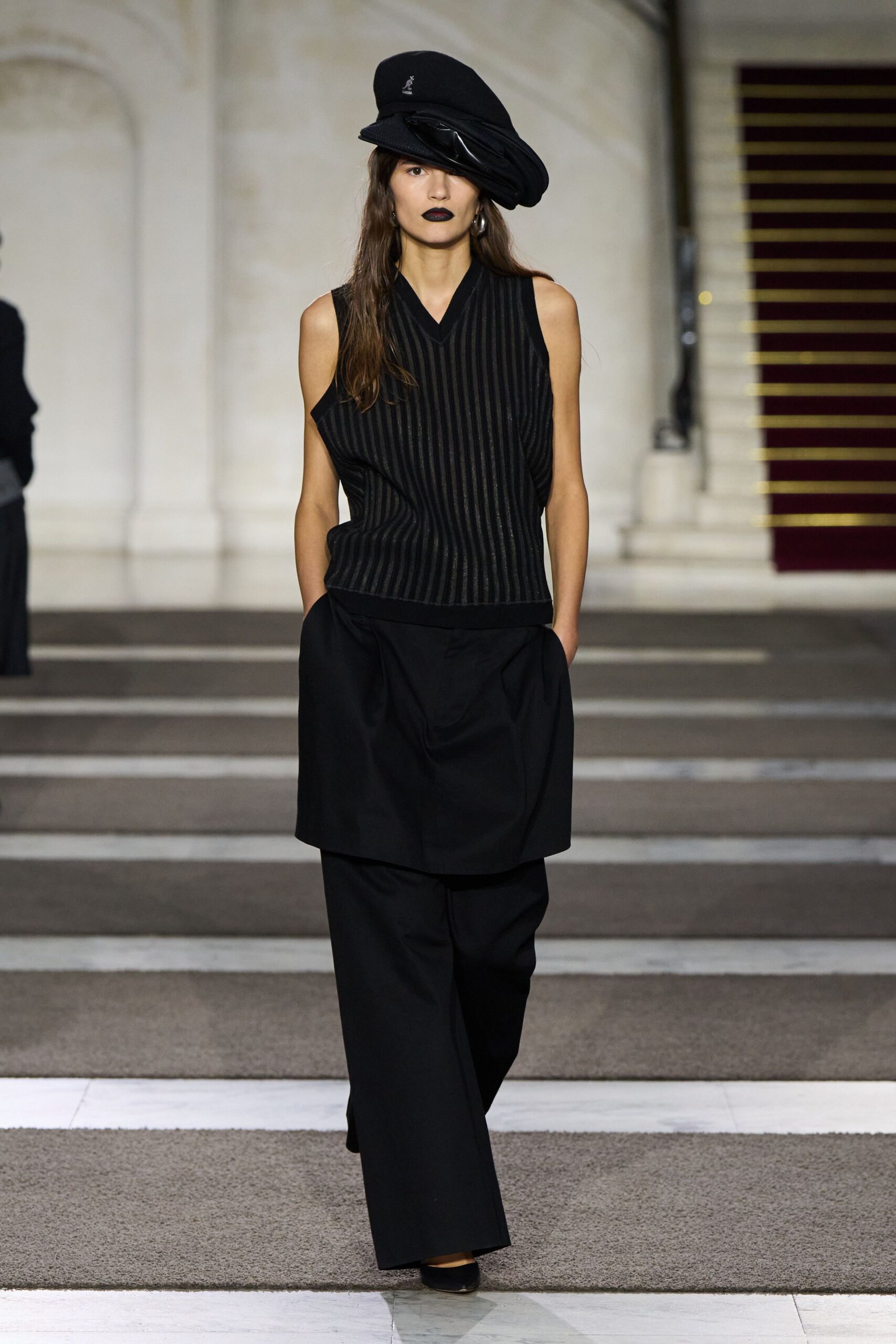 black sleeveless top with wide-leg pants