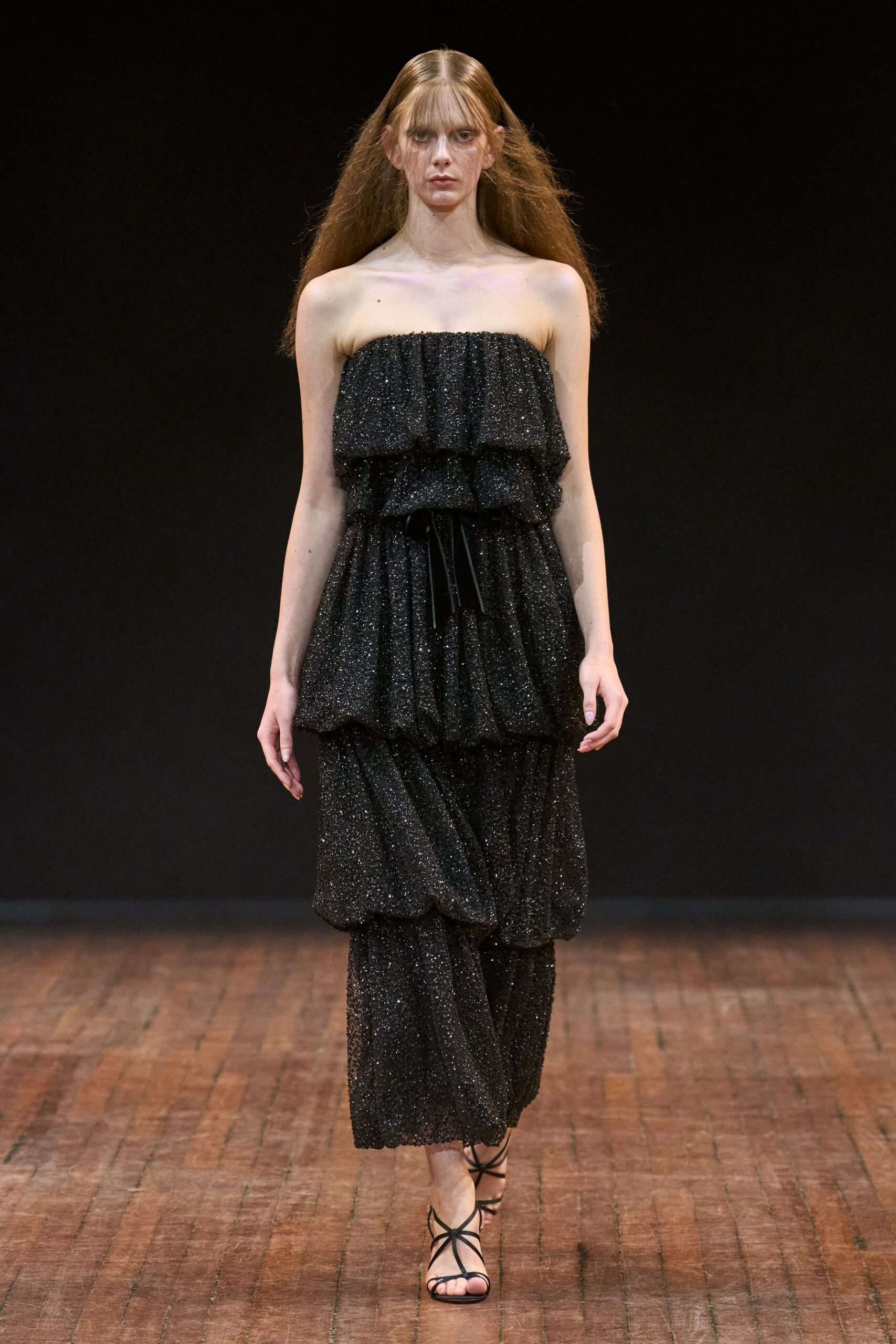black silk strapless relaxed ruffled tiered shiny dress