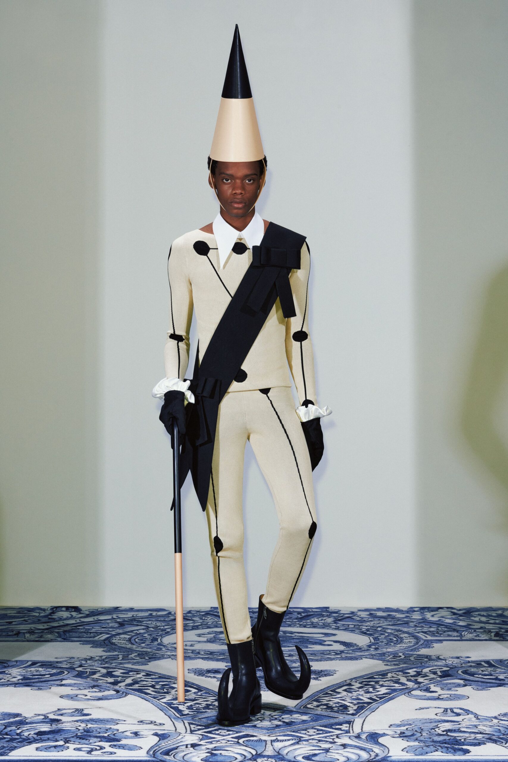 beige cotton long-sleeve collared fitted buttoned catsuit