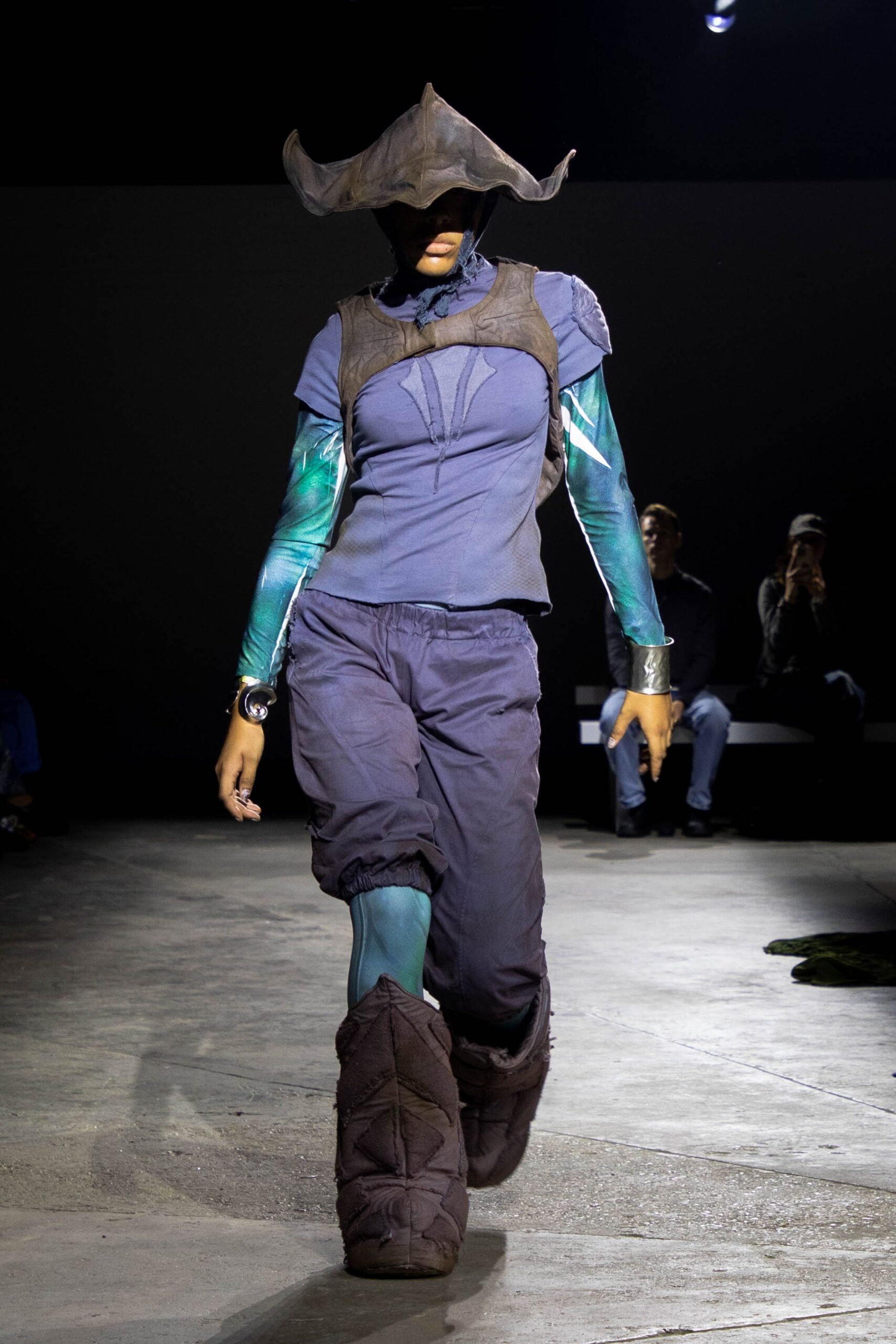 blue fitted top with cargo pants