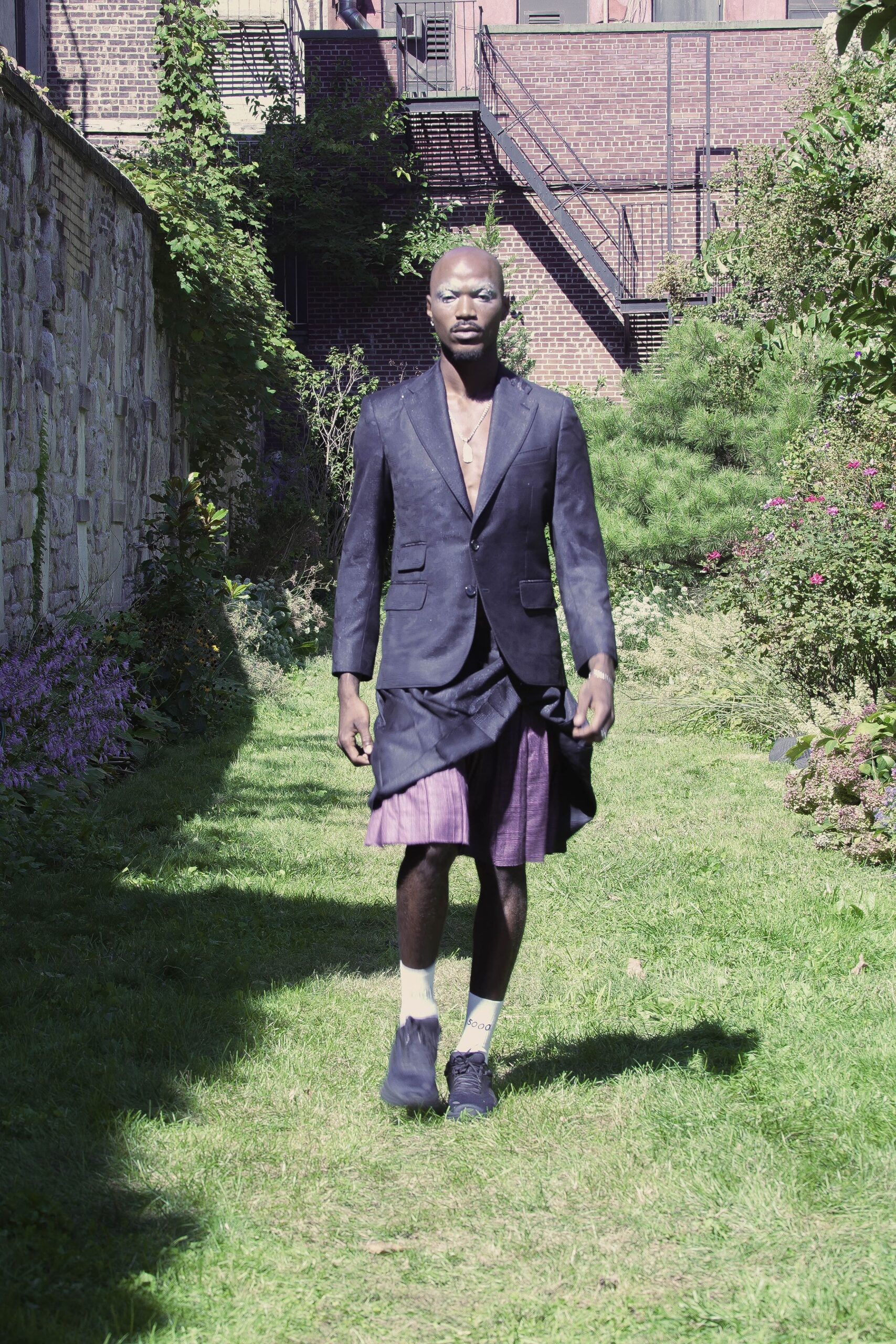 black blazer with purple skirt
